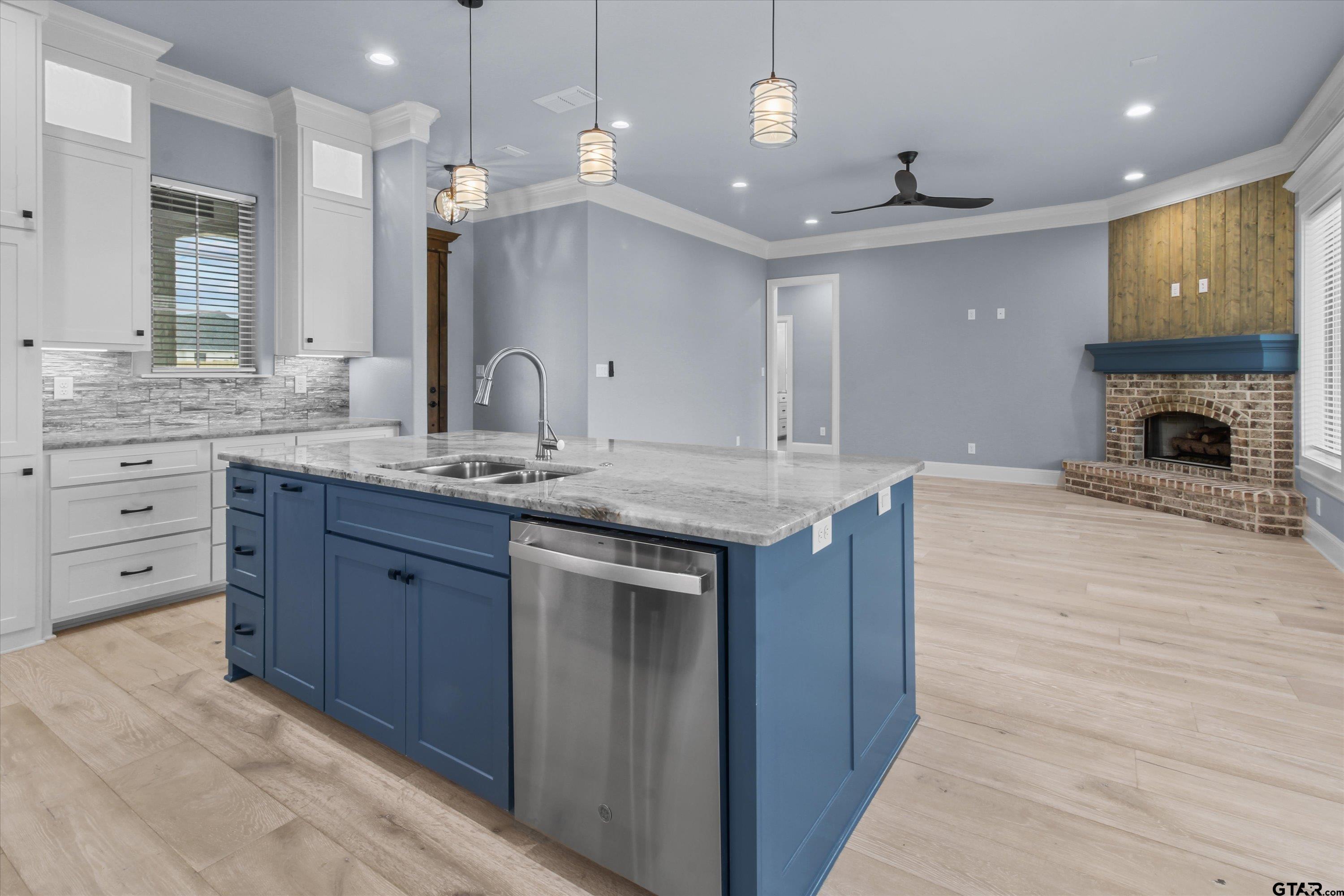 11236 Bryce Circle Flint, TX 75762 - Photo 15 of 44 a bathroom with a granite countertop sink a large mirror and a shower