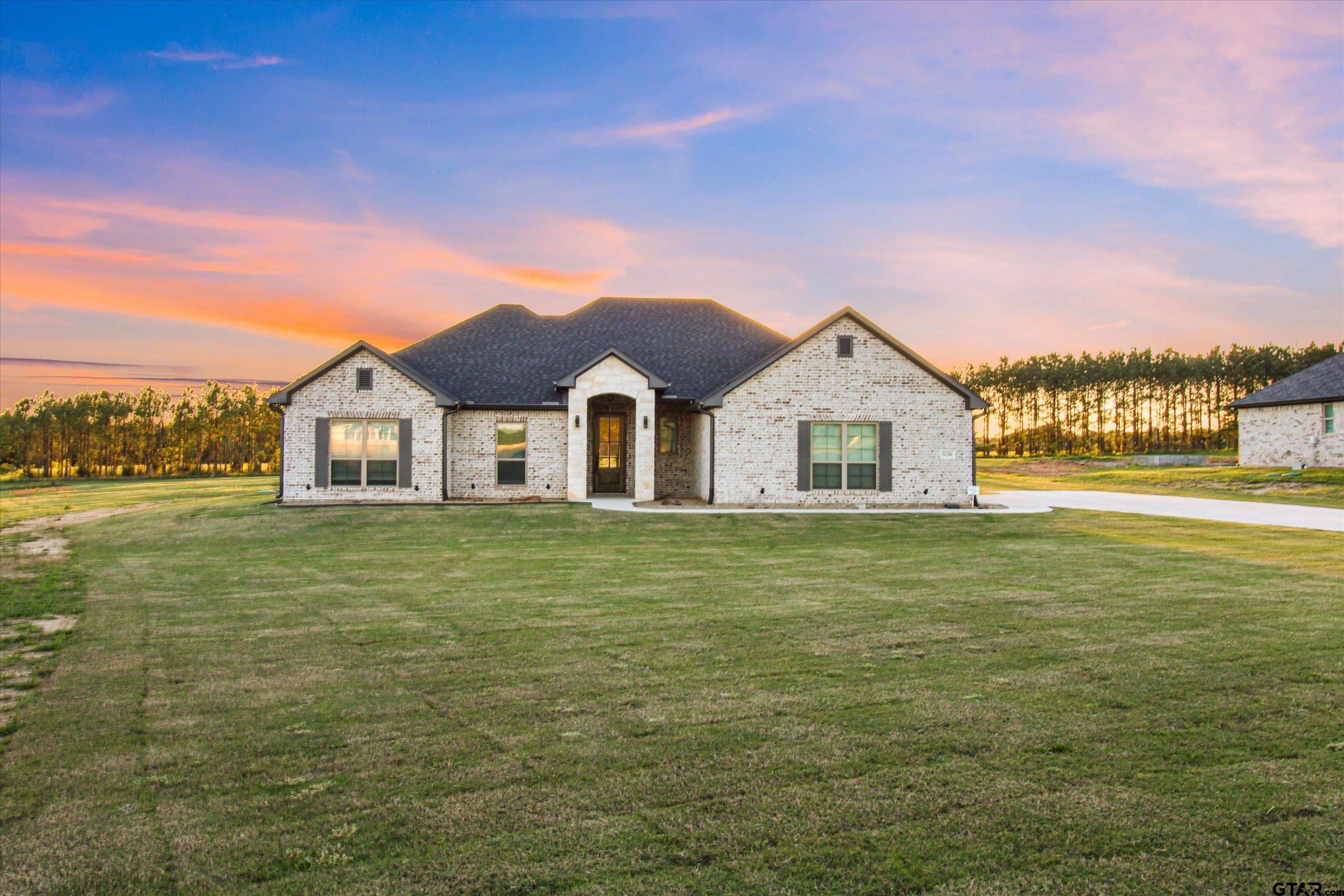 11236 Bryce Circle Flint, TX 75762 - Photo 2 of 44 a view of a house with a yard