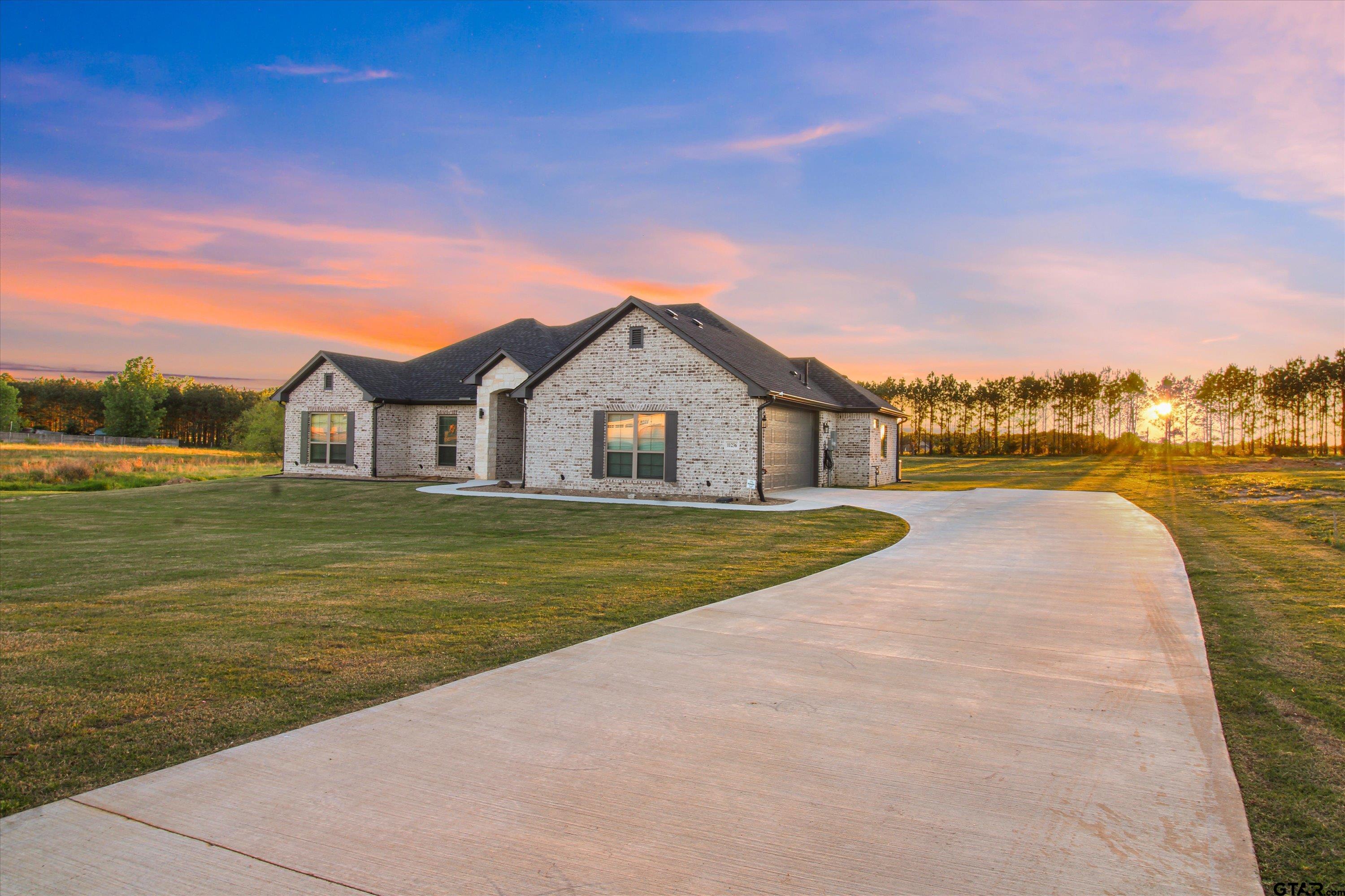 11236 Bryce Circle Flint, TX 75762 - Photo 43 of 44 a view of a house with a yard