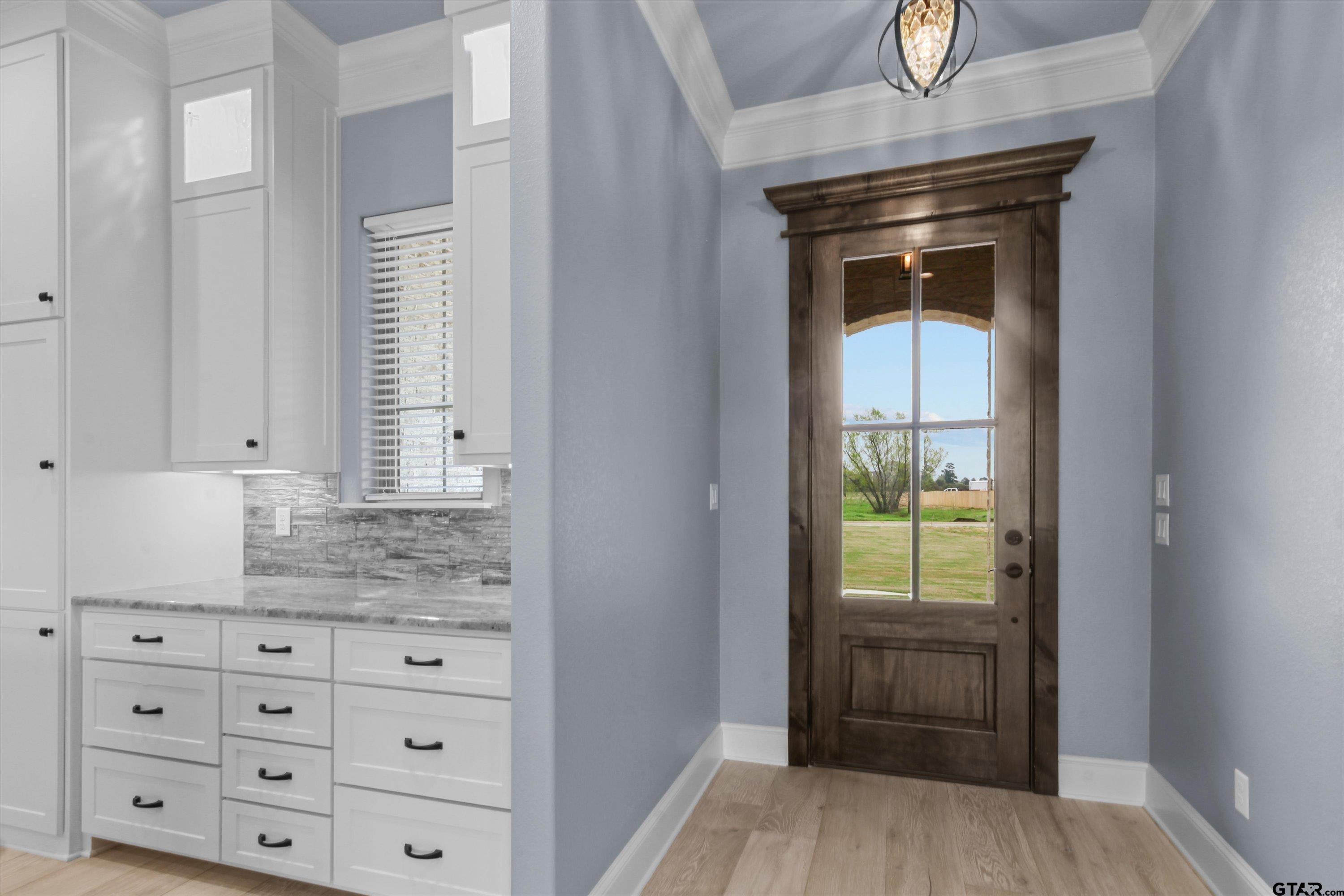 11236 Bryce Circle Flint, TX 75762 - Photo 9 of 44 a bathroom with a granite countertop sink and a window