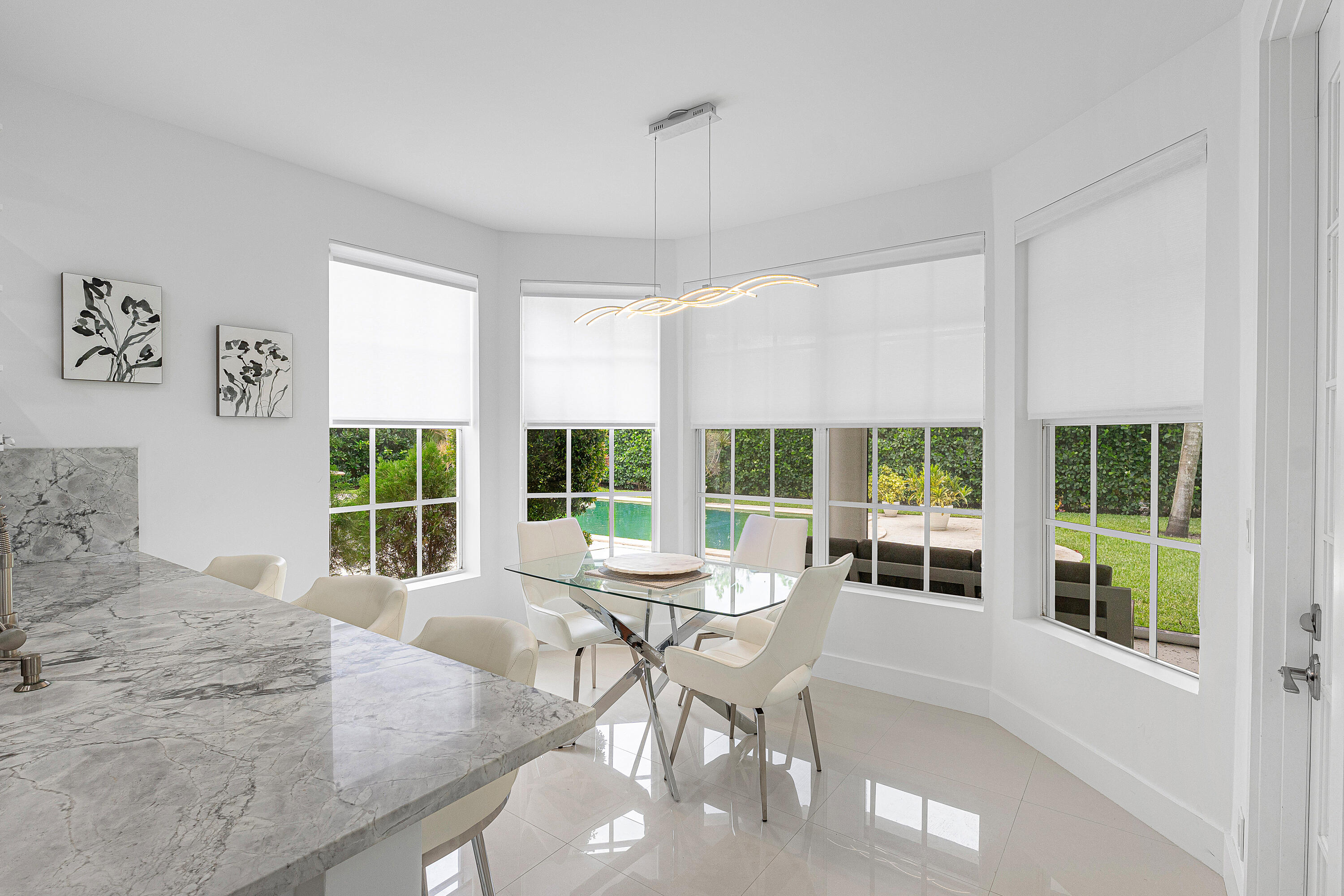 2197 Northwest 59th Street Boca Raton, FL 33496 - Photo 12 of 62 a living room with furniture and a large window