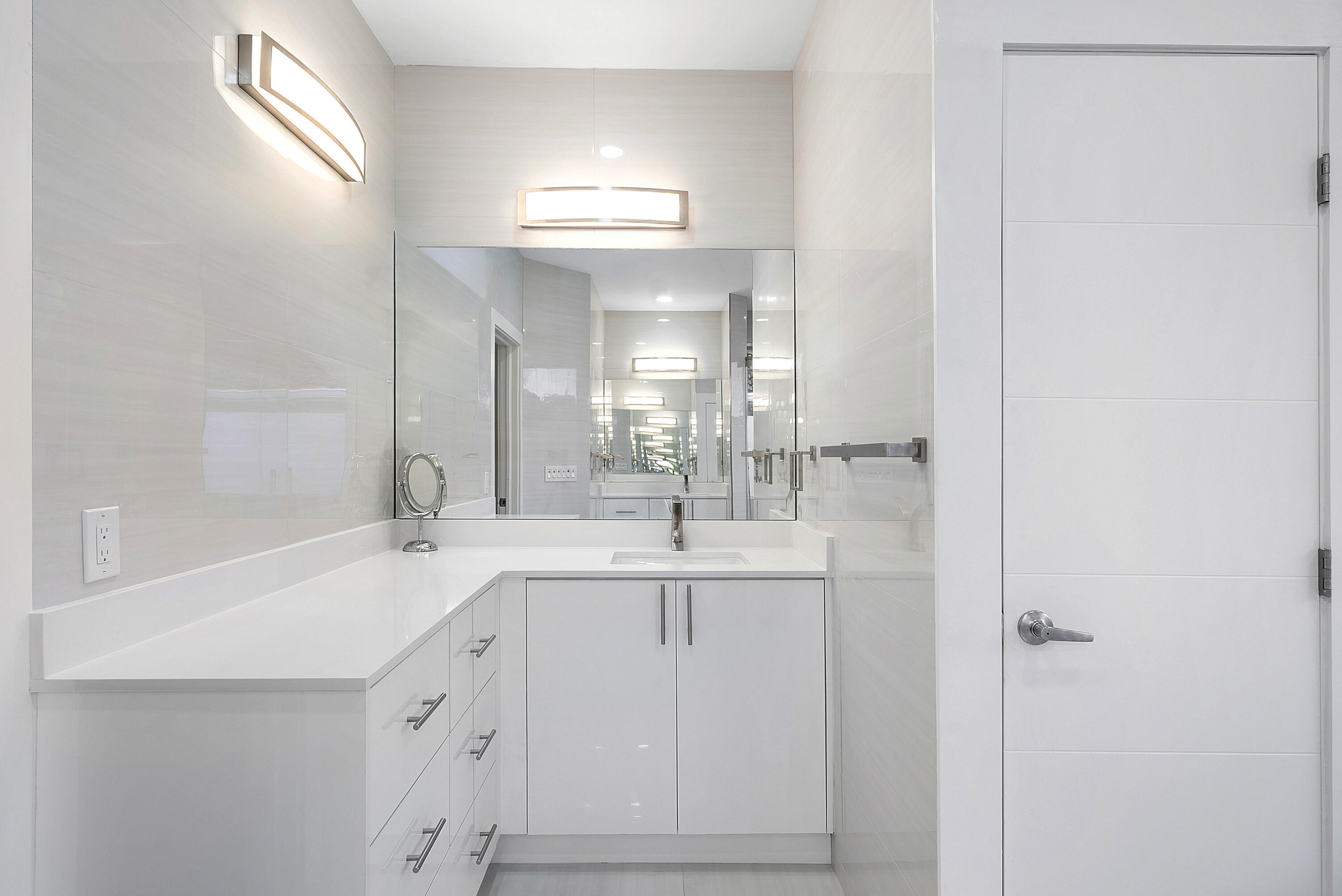 2197 Northwest 59th Street Boca Raton, FL 33496 - Photo 23 of 62 a bathroom with a sink double vanity and a mirror
