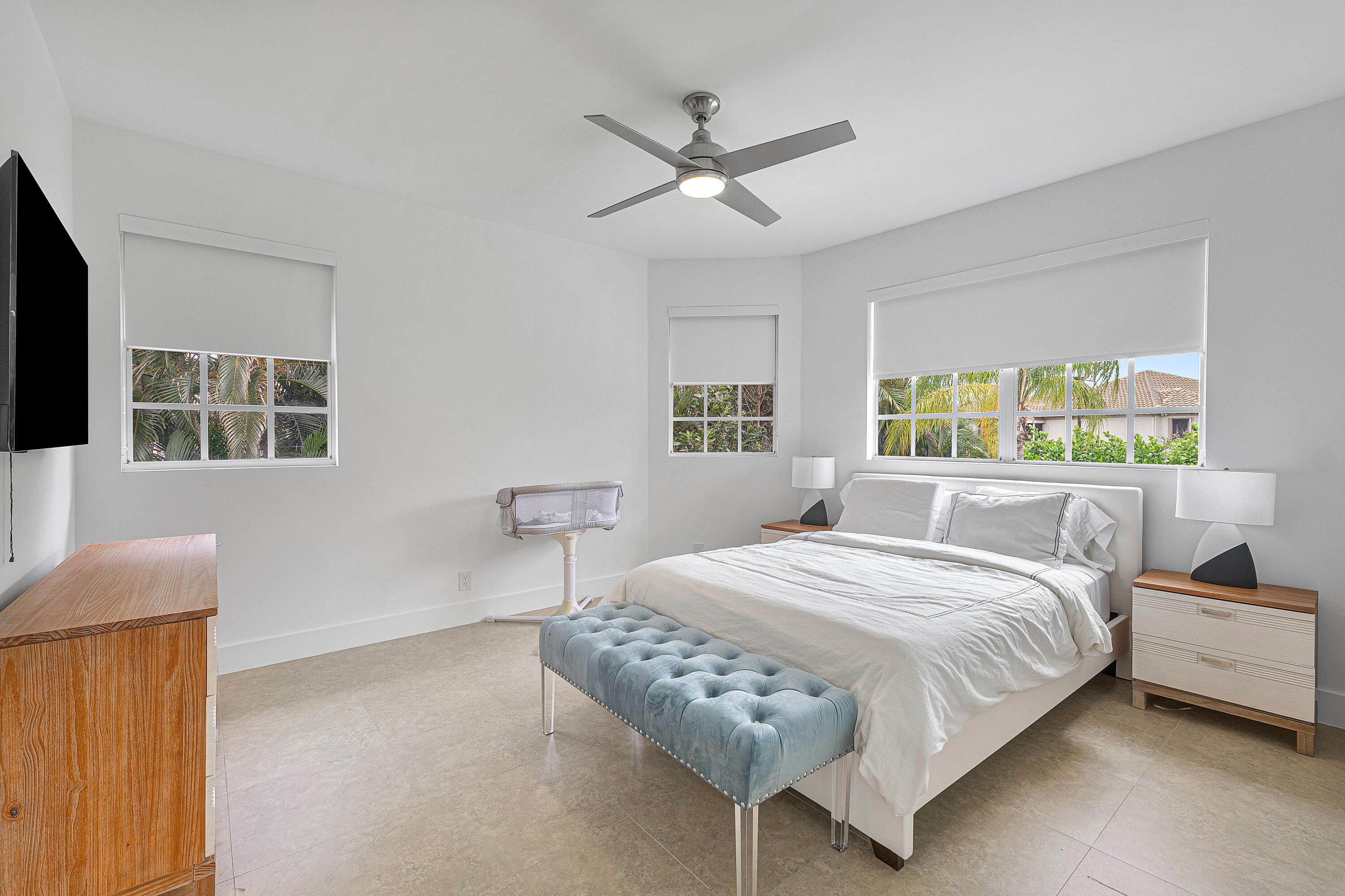2197 Northwest 59th Street Boca Raton, FL 33496 - Photo 36 of 62 a bedroom with a bed window and a table