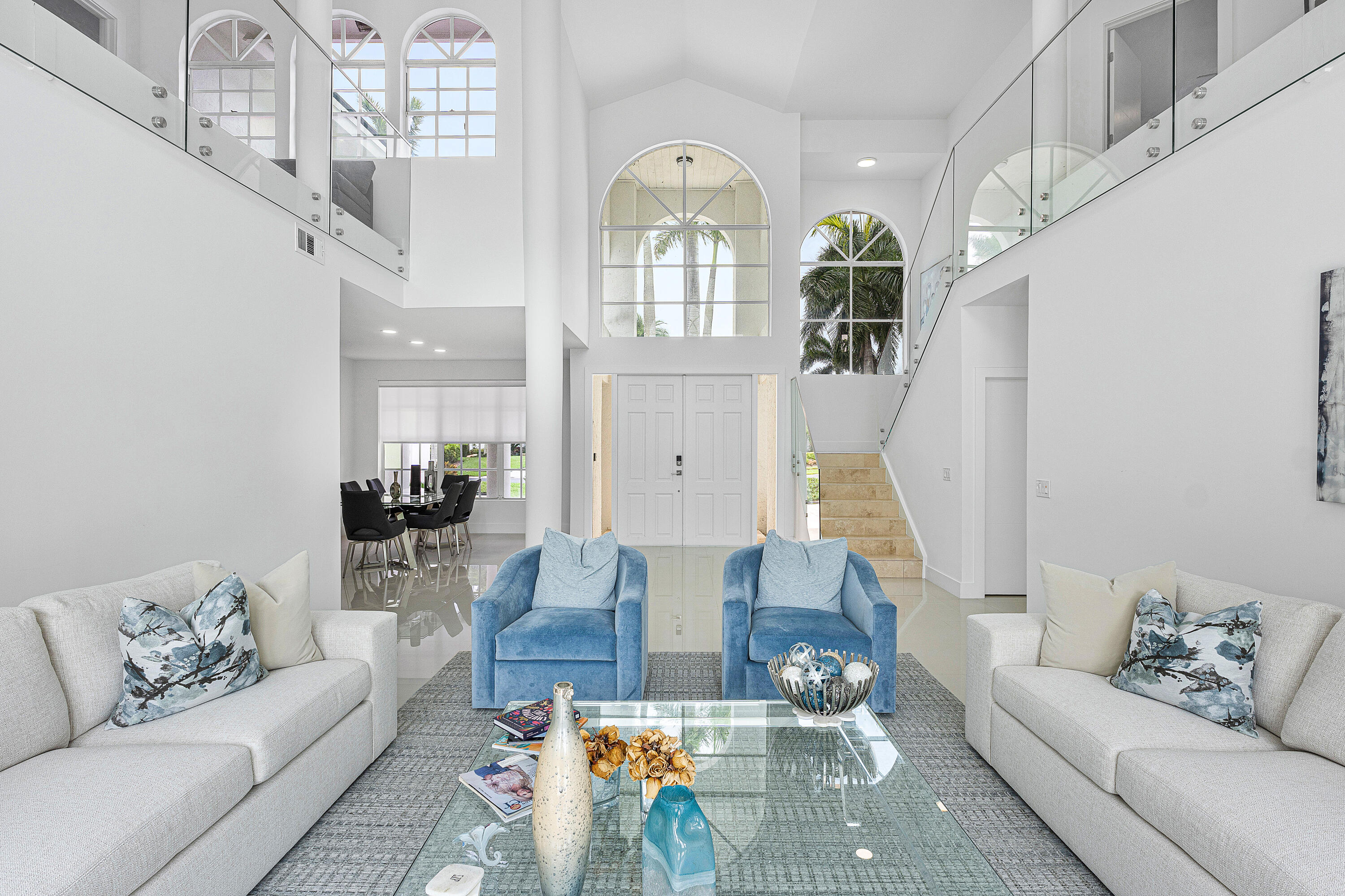 2197 Northwest 59th Street Boca Raton, FL 33496 - Photo 6 of 62 a living room with furniture chandelier and a chandelier