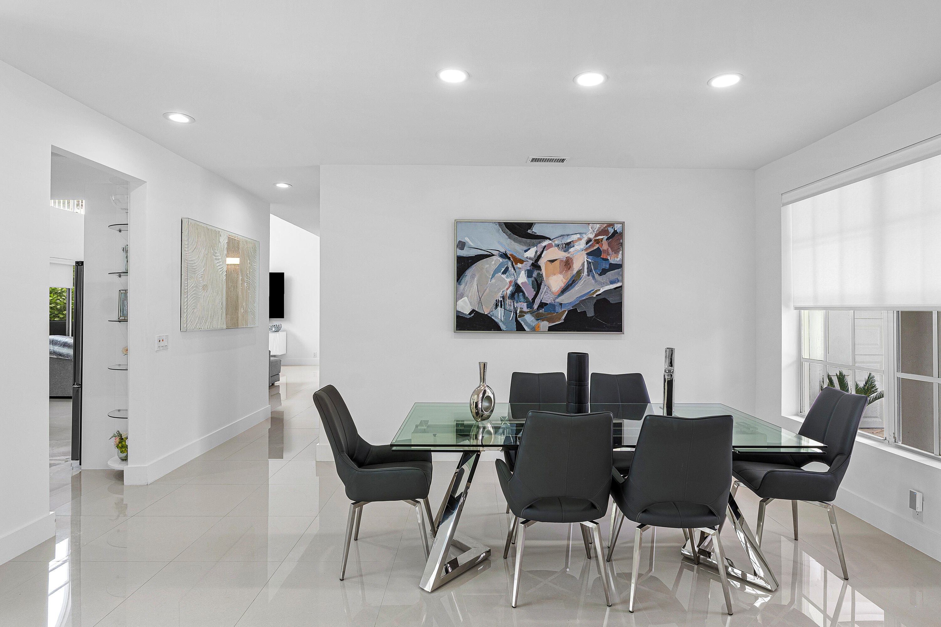 2197 Northwest 59th Street Boca Raton, FL 33496 - Photo 7 of 62 a view of a dining room with furniture