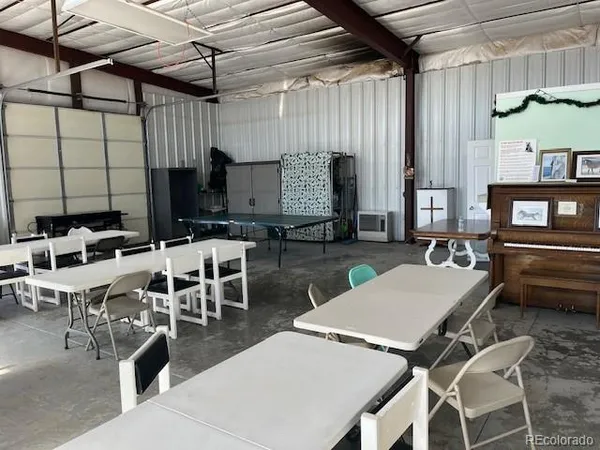 a room with furniture and a window