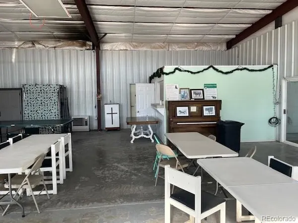 a kitchen with stainless steel appliances a refrigerator and a stove