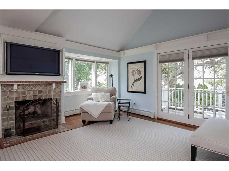 20 Beach Drive Darien, CT 06820 - Photo 15 of 25 a living room with furniture and a fireplace