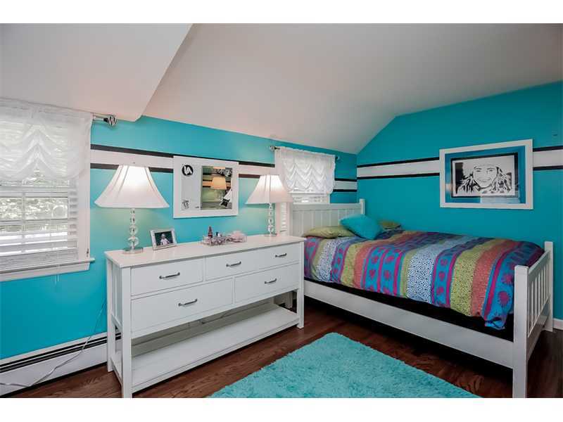 20 Beach Drive Darien, CT 06820 - Photo 17 of 25 a bedroom with a bed and window