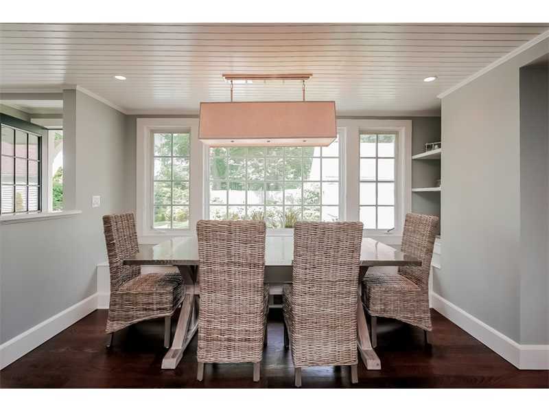 20 Beach Drive Darien, CT 06820 - Photo 10 of 25 a dining room with furniture and large windows
