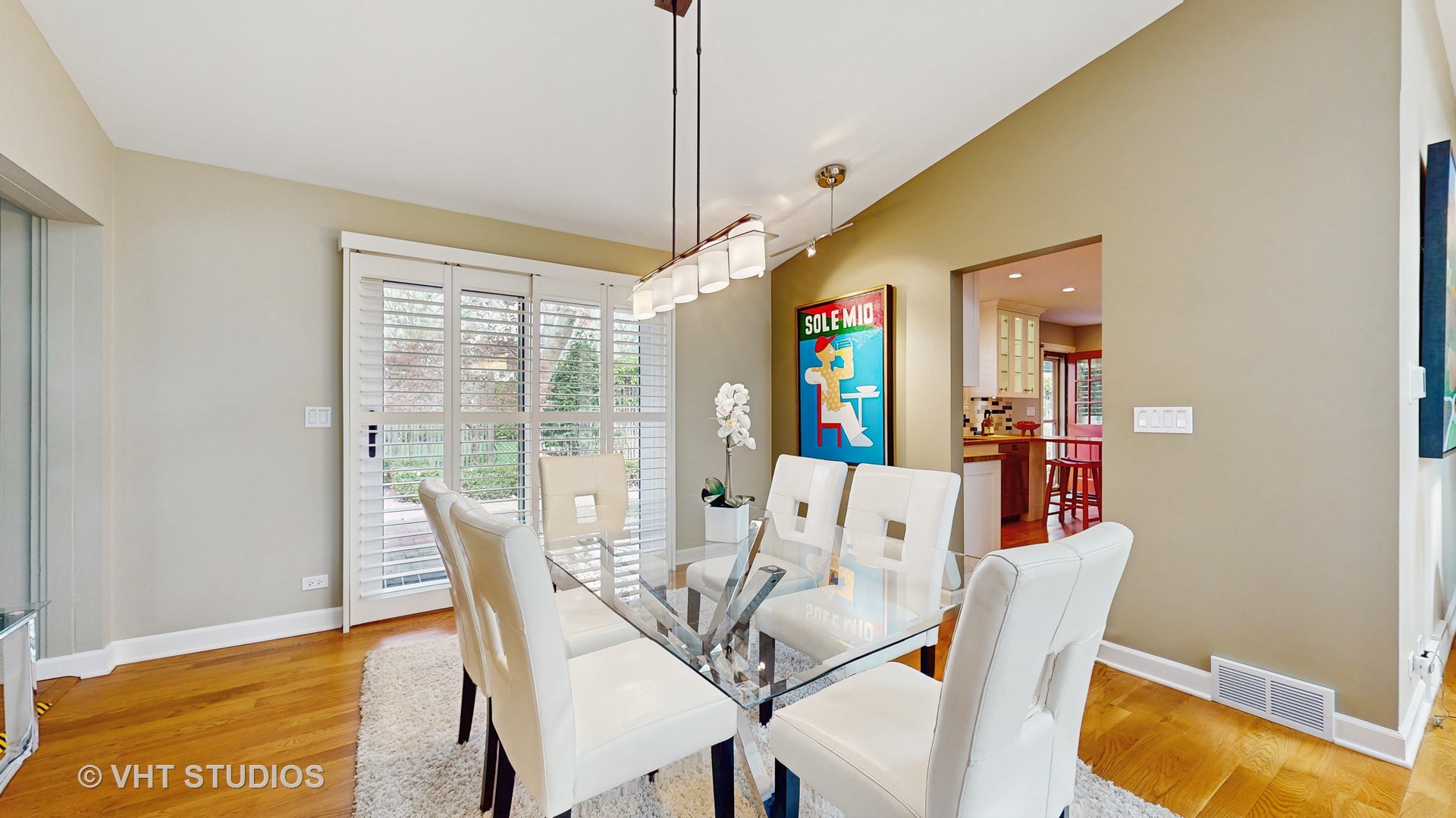 1321 Sheridan Road Wilmette, IL 60091 - Photo 12 of 36 a view of a dining room with furniture window and wooden floor