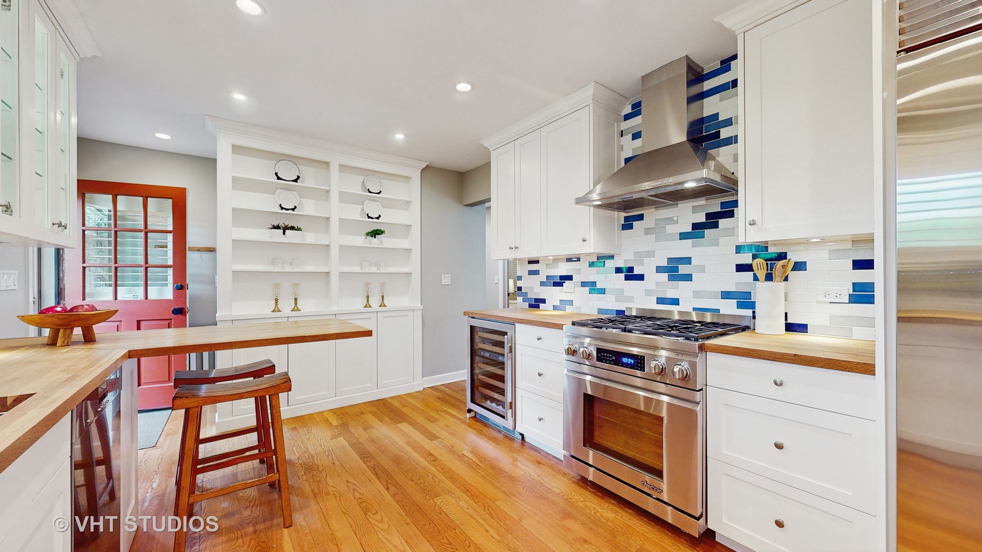 1321 Sheridan Road Wilmette, IL 60091 - Photo 16 of 36 a kitchen with stainless steel appliances a stove a sink and a refrigerator