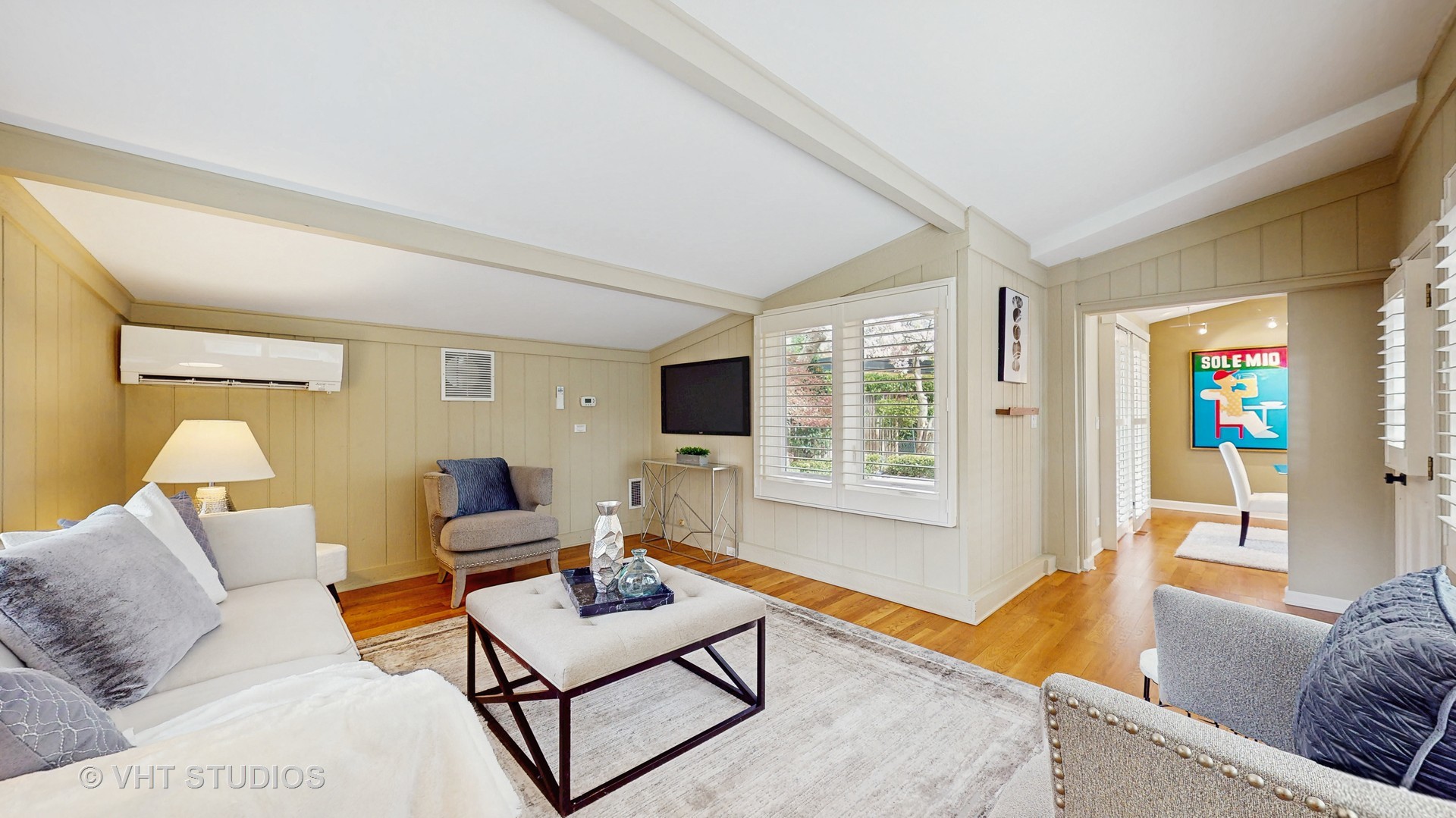 1321 Sheridan Road Wilmette, IL 60091 - Photo 10 of 36 a living room with furniture and a flat screen tv