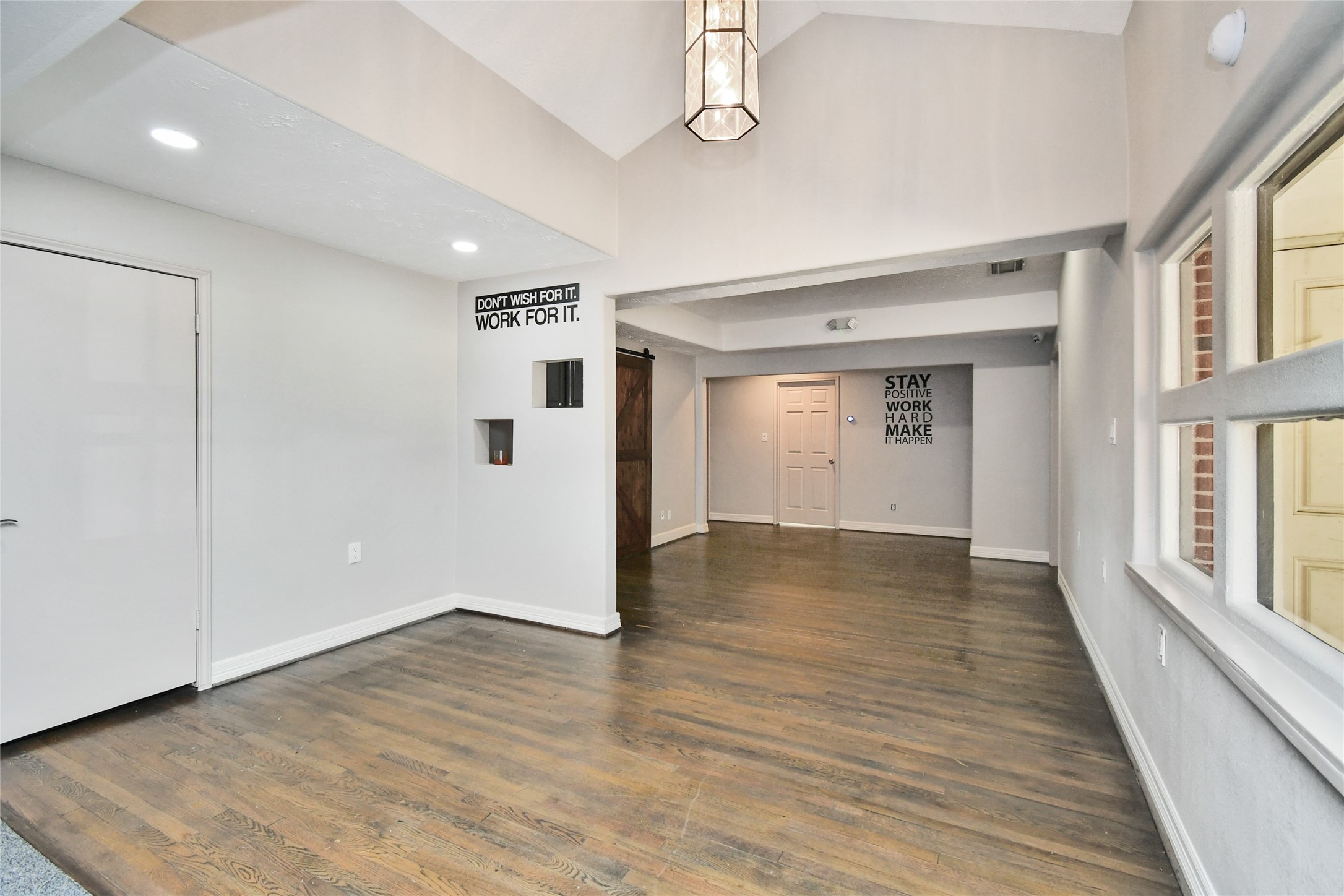 5035 North Freeway Houston, TX 77022 - Photo 25 of 38 a view of a hallway with wooden floor and closet area