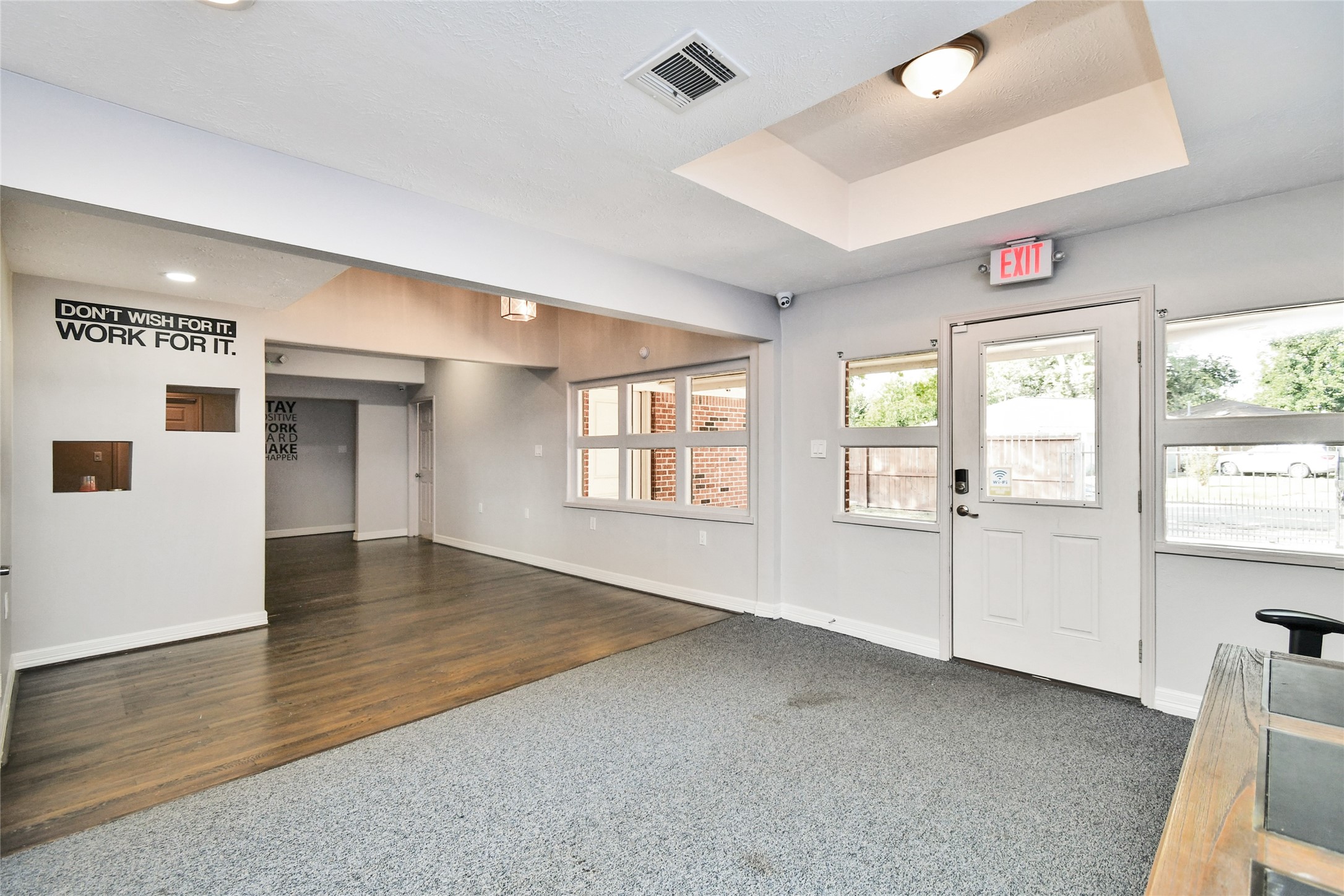 5035 North Freeway Houston, TX 77022 - Photo 27 of 38 a view of an empty room with wooden floor and a window