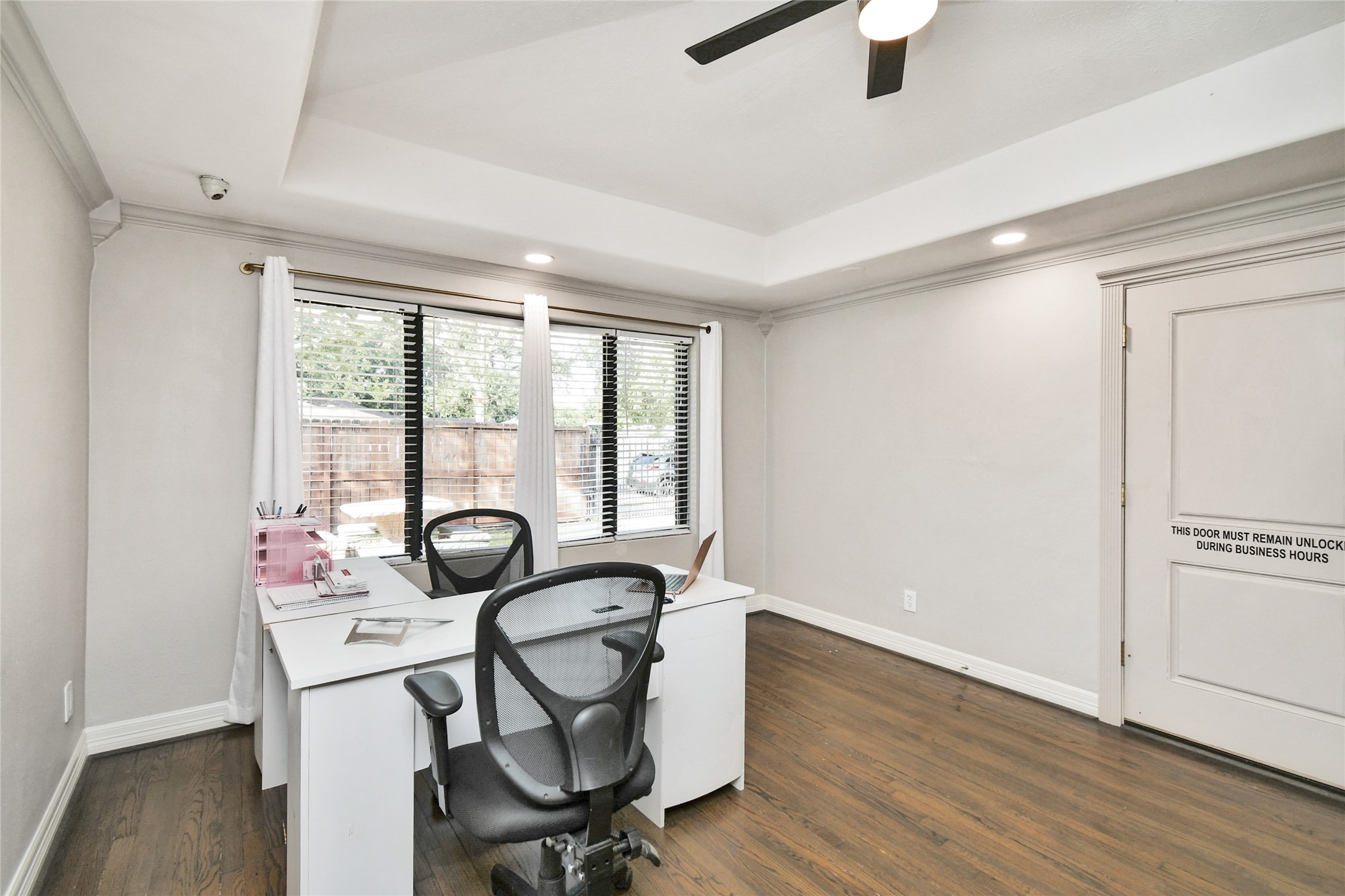 5035 North Freeway Houston, TX 77022 - Photo 9 of 38 a view of a workspace with furniture and a window