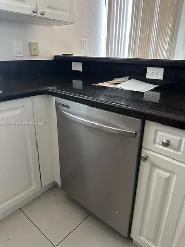 a close view of utility room and sink