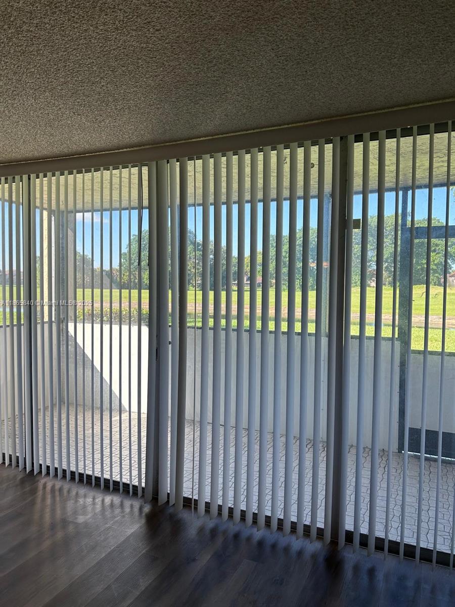 a view of a black and white floor to ceiling window