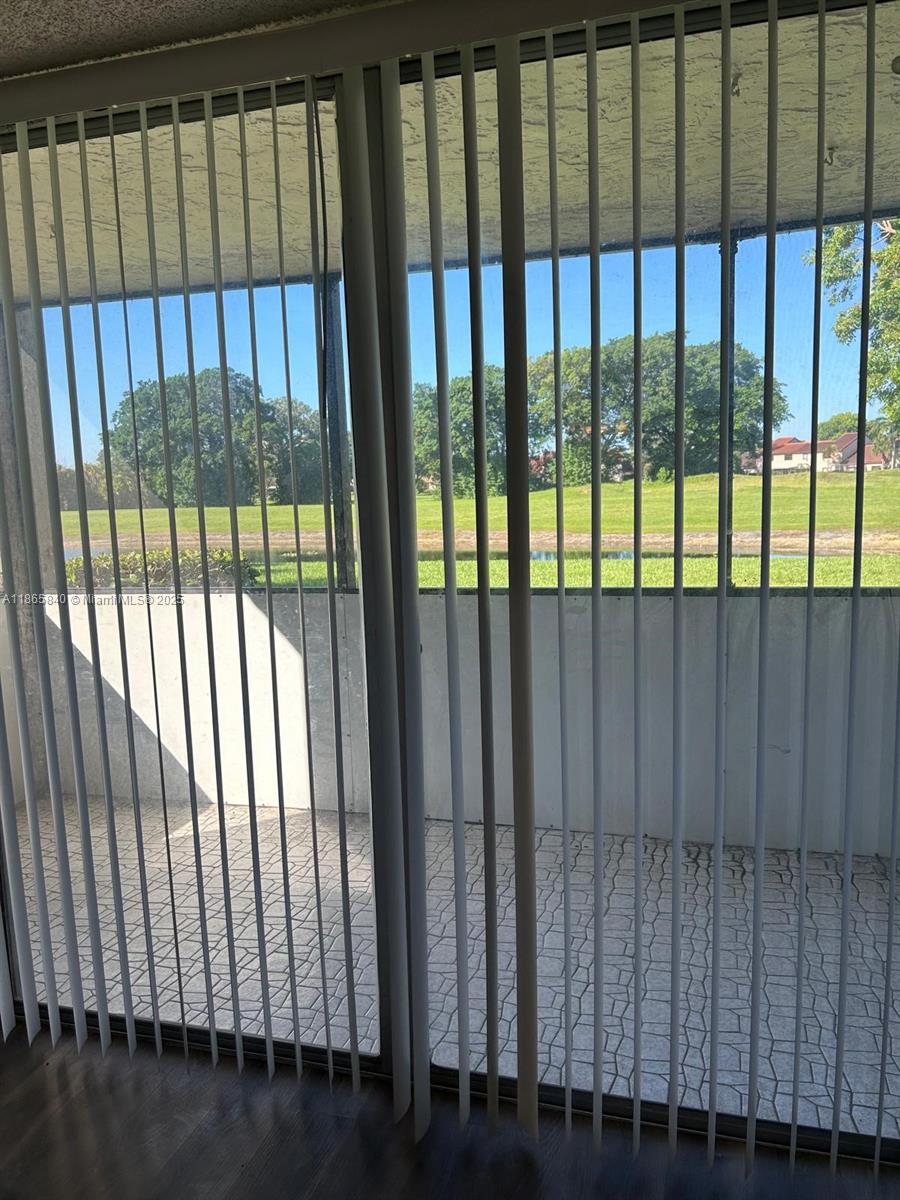 3671 Environ Boulevard, Unit 164 Lauderhill, FL 33319 - Photo 2 of 27 a view of a black gate