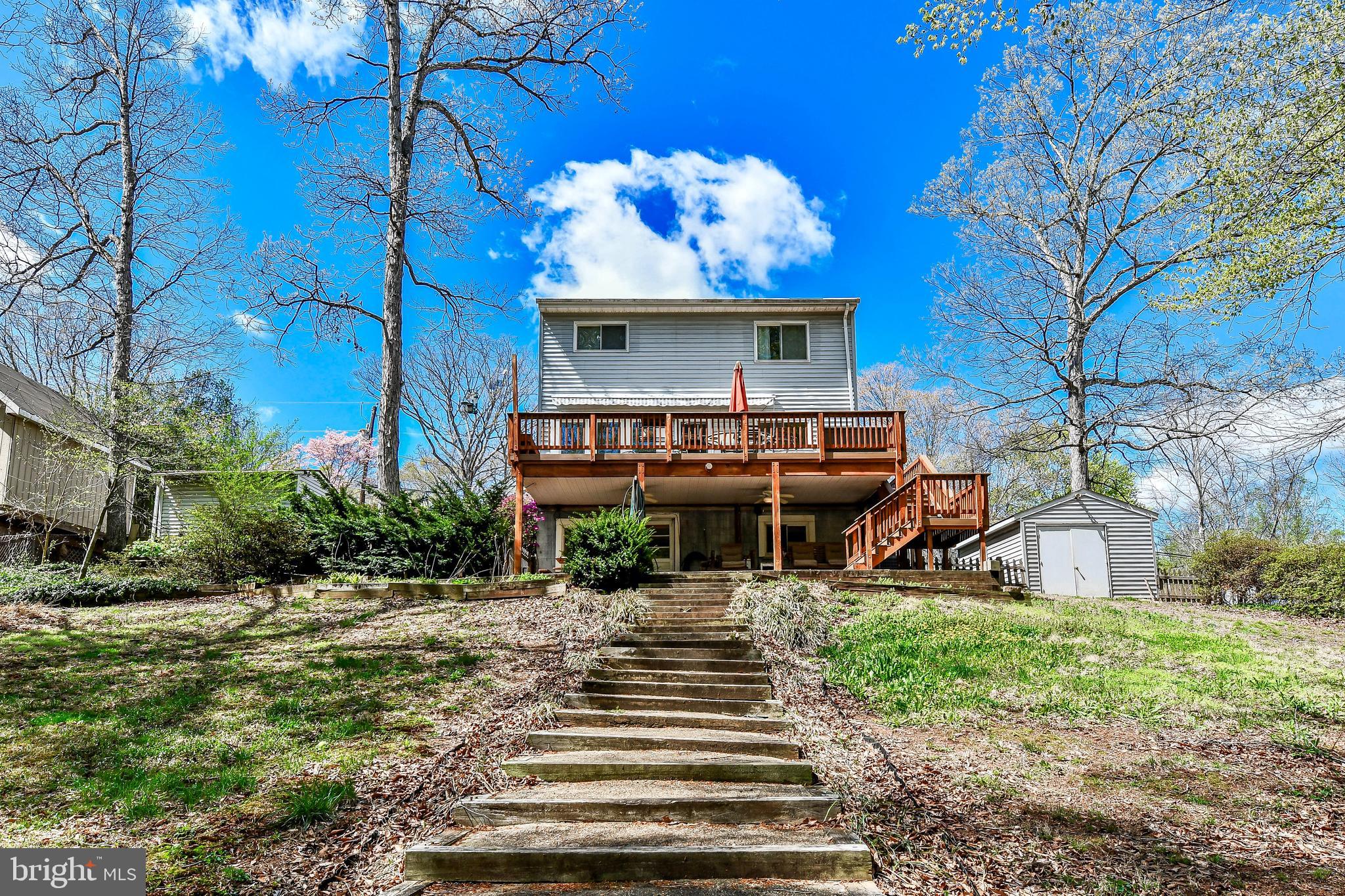 7809 Lake Drive Manassas, VA 20111 - Photo 27 of 44 a view of a chairs and tables in the patio