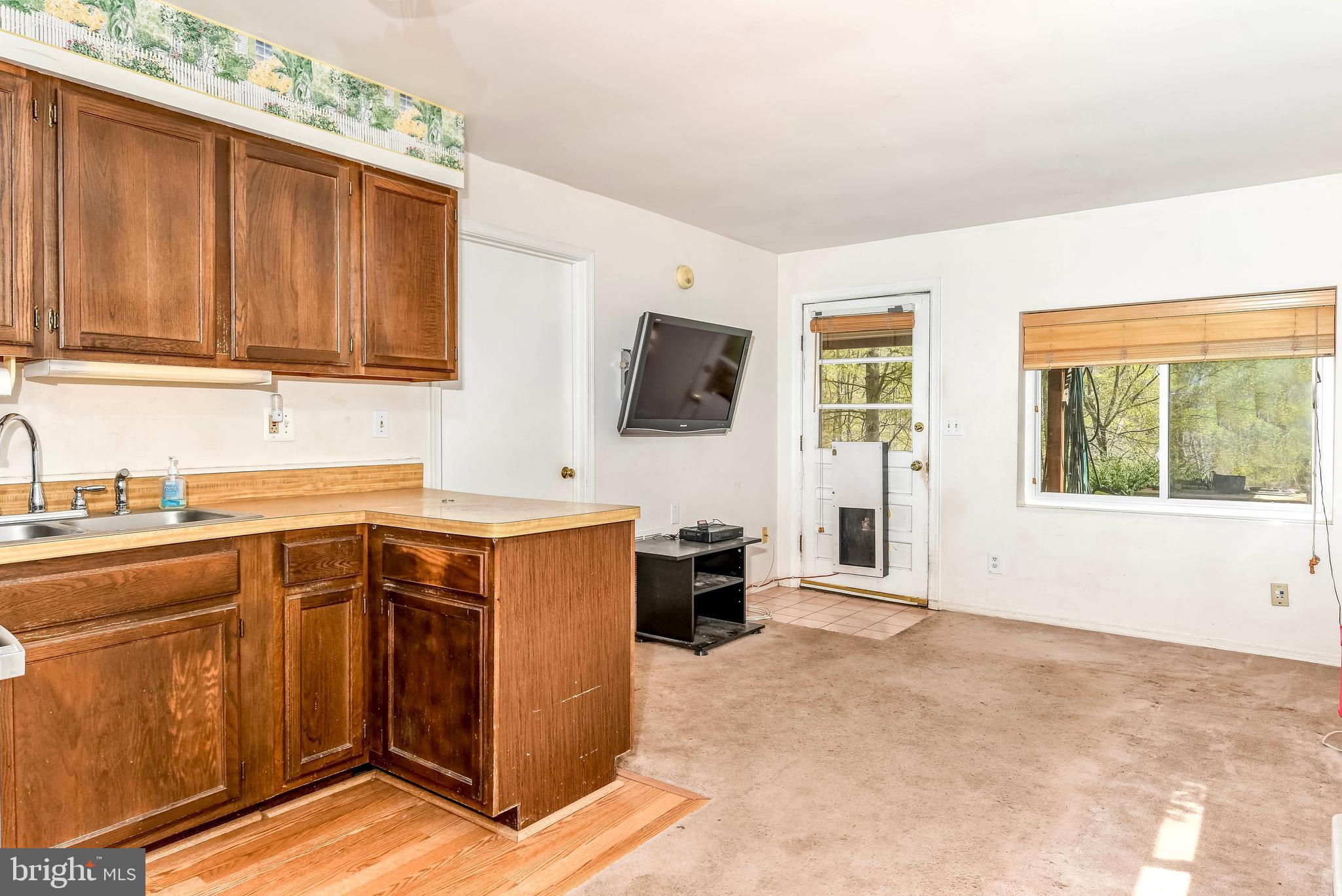 7809 Lake Drive Manassas, VA 20111 - Photo 30 of 44 a view of a kitchen with cabinets