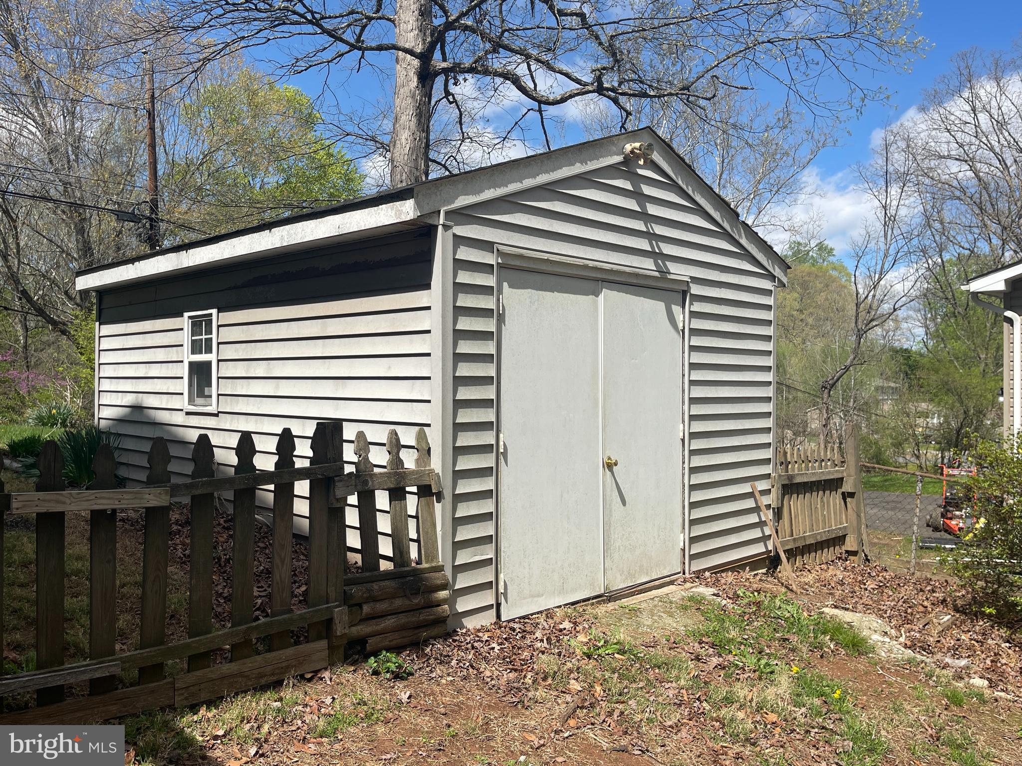 7809 Lake Drive Manassas, VA 20111 - Photo 34 of 44 a view of a house with a yard