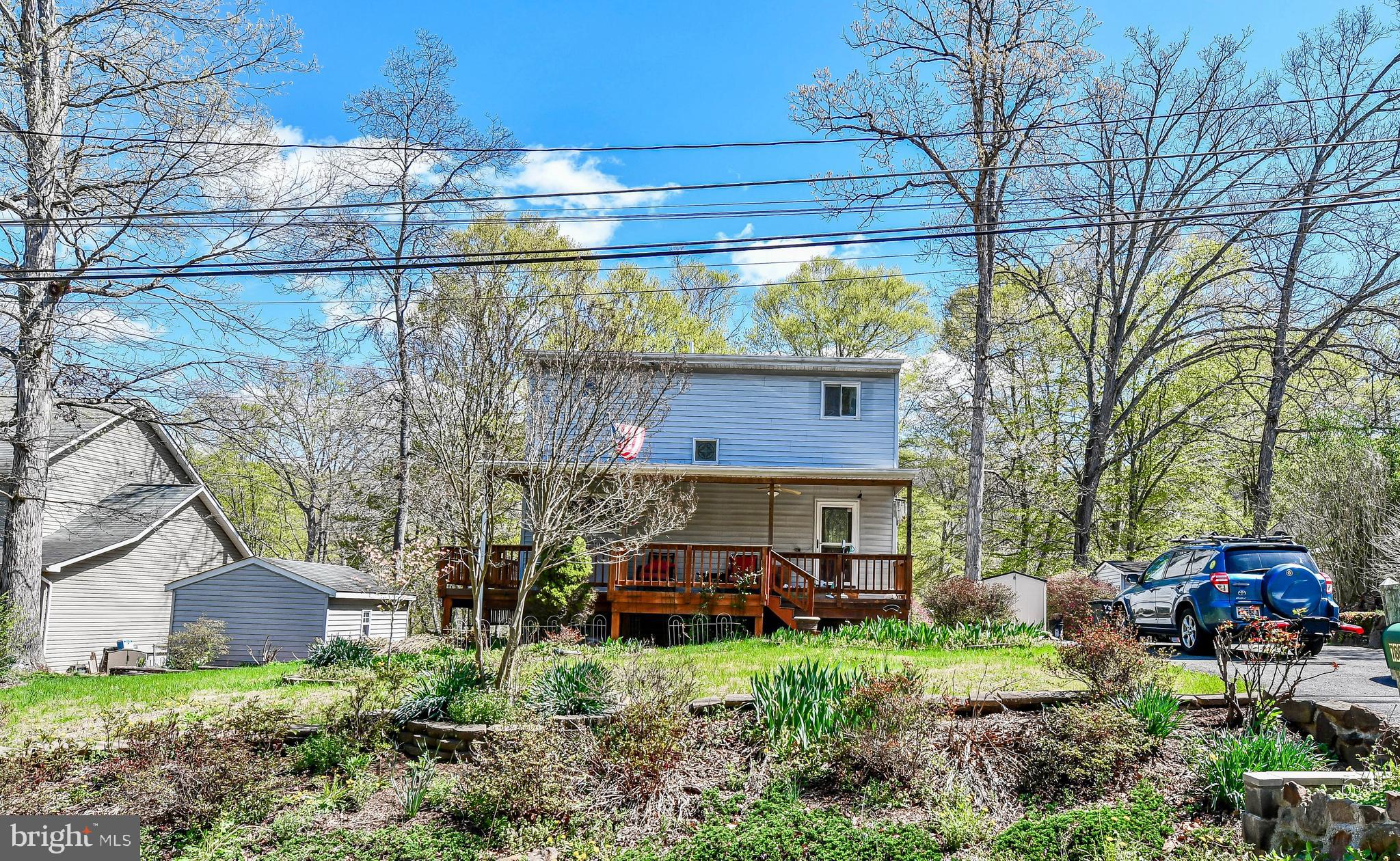 7809 Lake Drive Manassas, VA 20111 - Photo 38 of 44 a front view of a house with garden