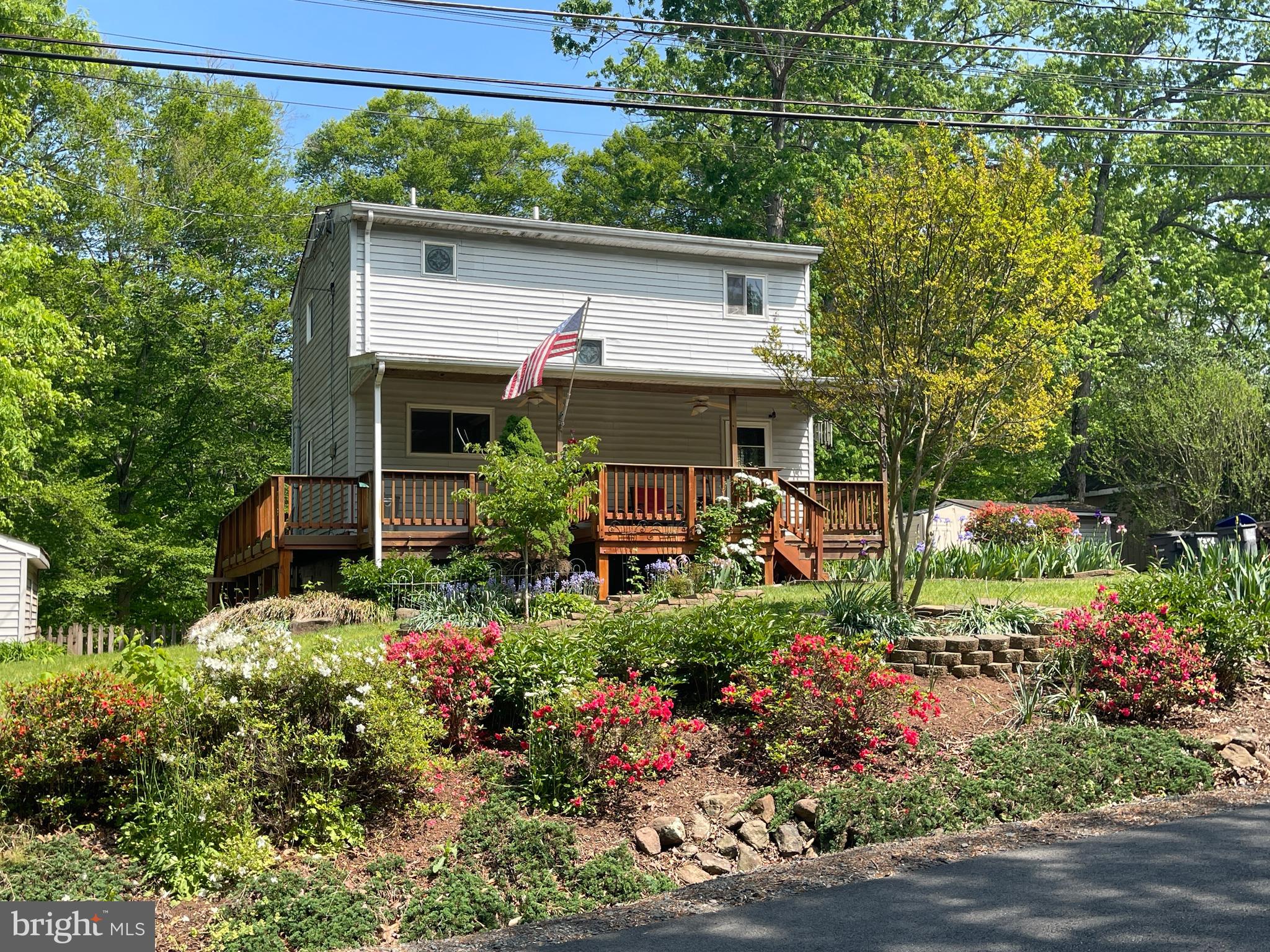 7809 Lake Drive Manassas, VA 20111 - Photo 5 of 44 a house view with a garden space