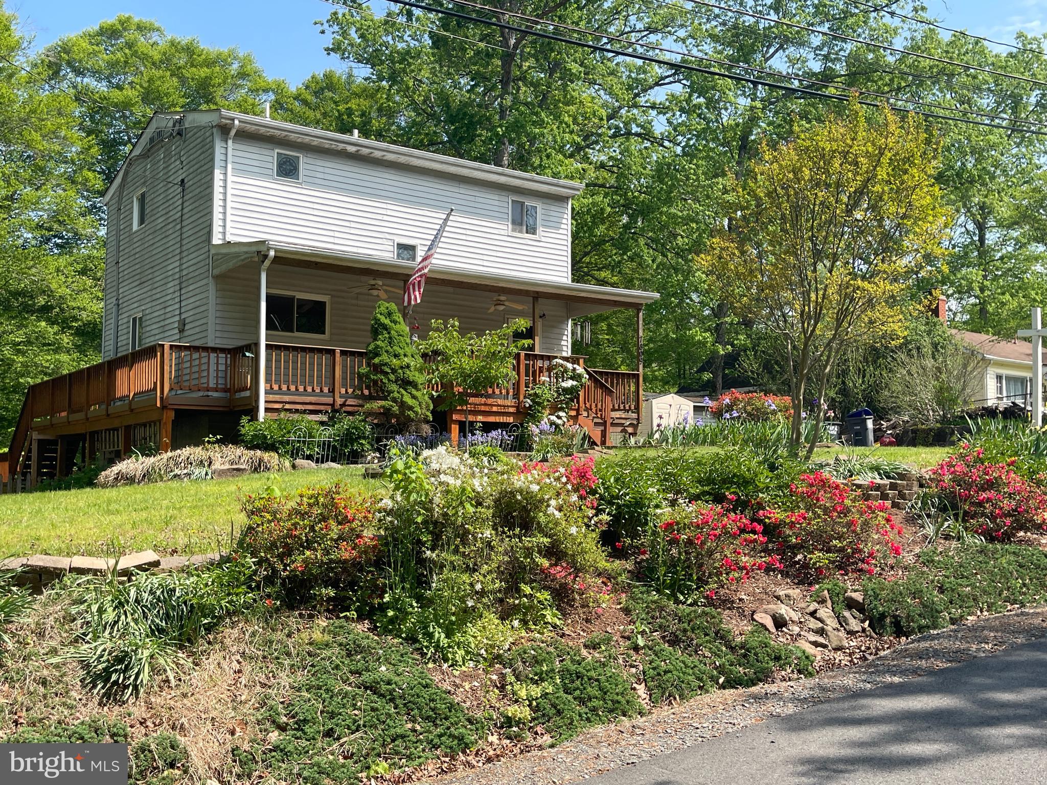 7809 Lake Drive Manassas, VA 20111 - Photo 6 of 44 front view of a house with a yard