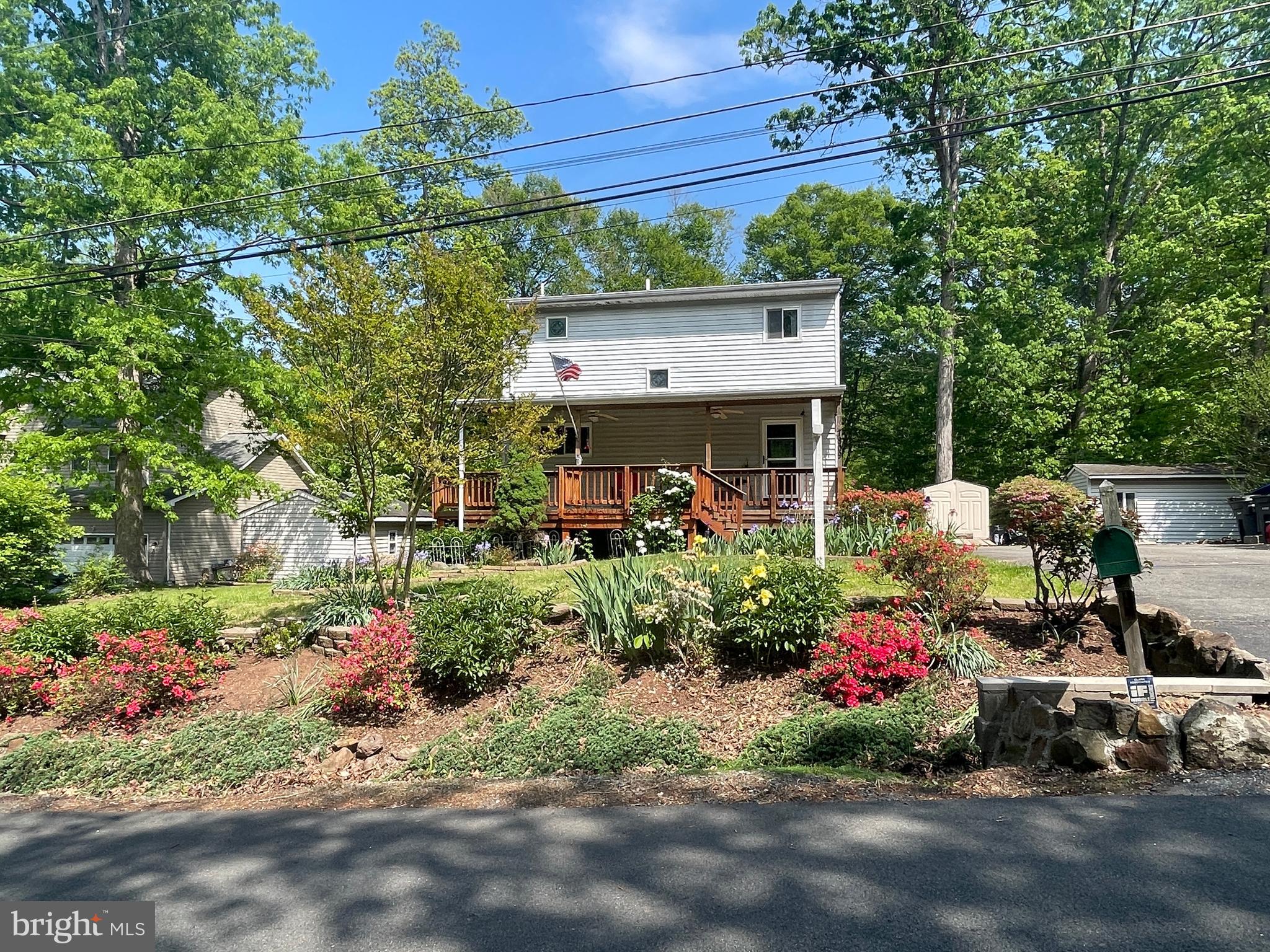 7809 Lake Drive Manassas, VA 20111 - Photo 7 of 44 a front view of a house with a yard