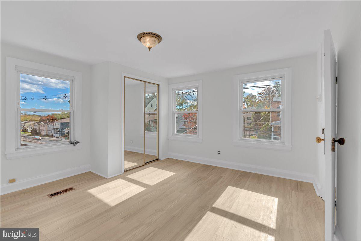 111 Ellis Street Haddonfield, NJ 08033 - Photo 13 of 20 an empty room with windows and closet