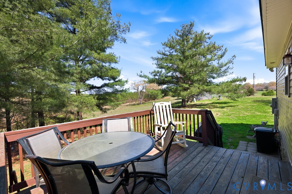 18262 Seals Road Bowling Green, VA 22427 - Photo 31 of 50 a view of a patio on the deck
