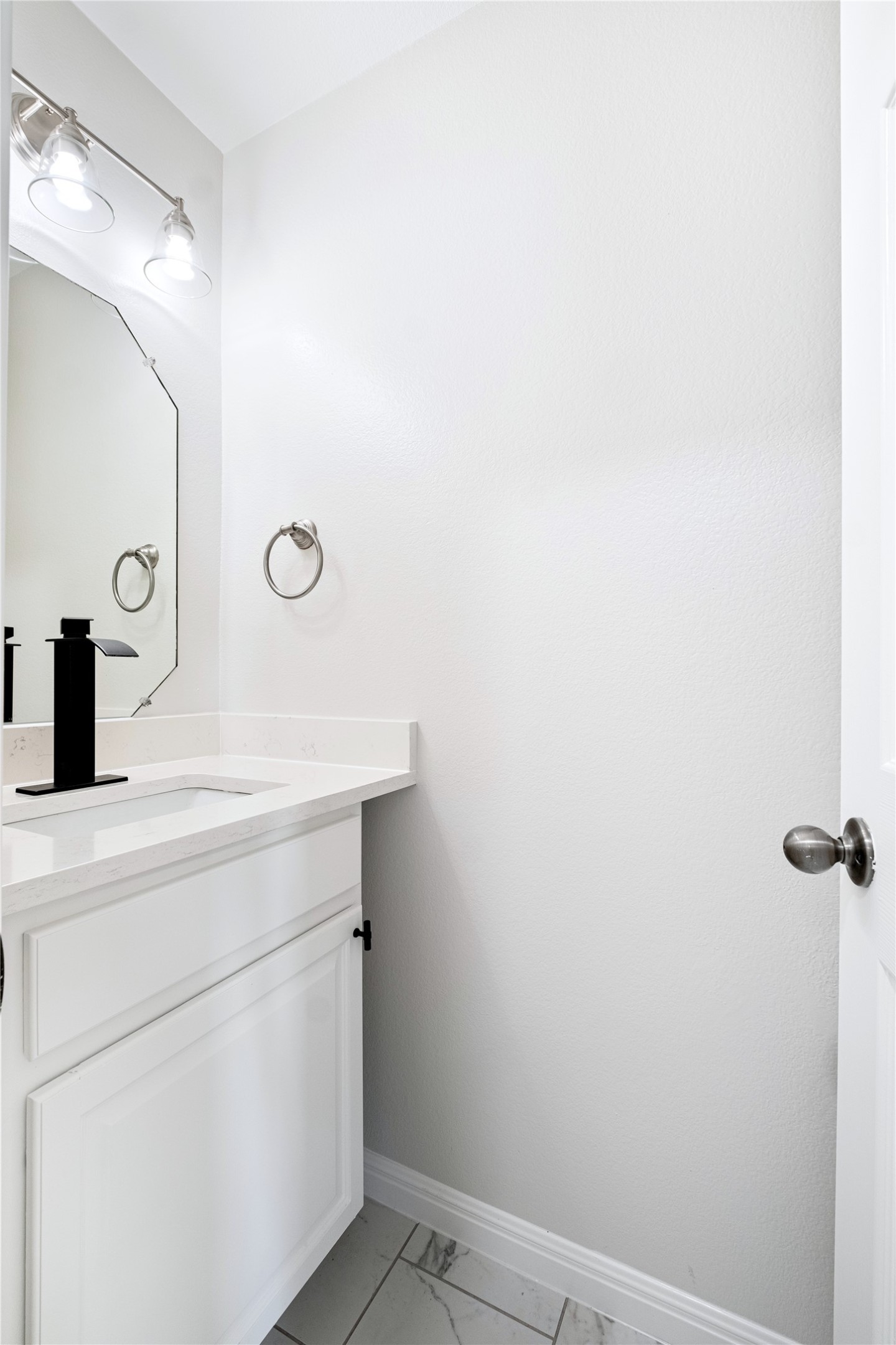 1400 Portchester Castle Path Pflugerville, TX 78660 - Photo 34 of 40 Bathroom with vanity and light marble finish floors