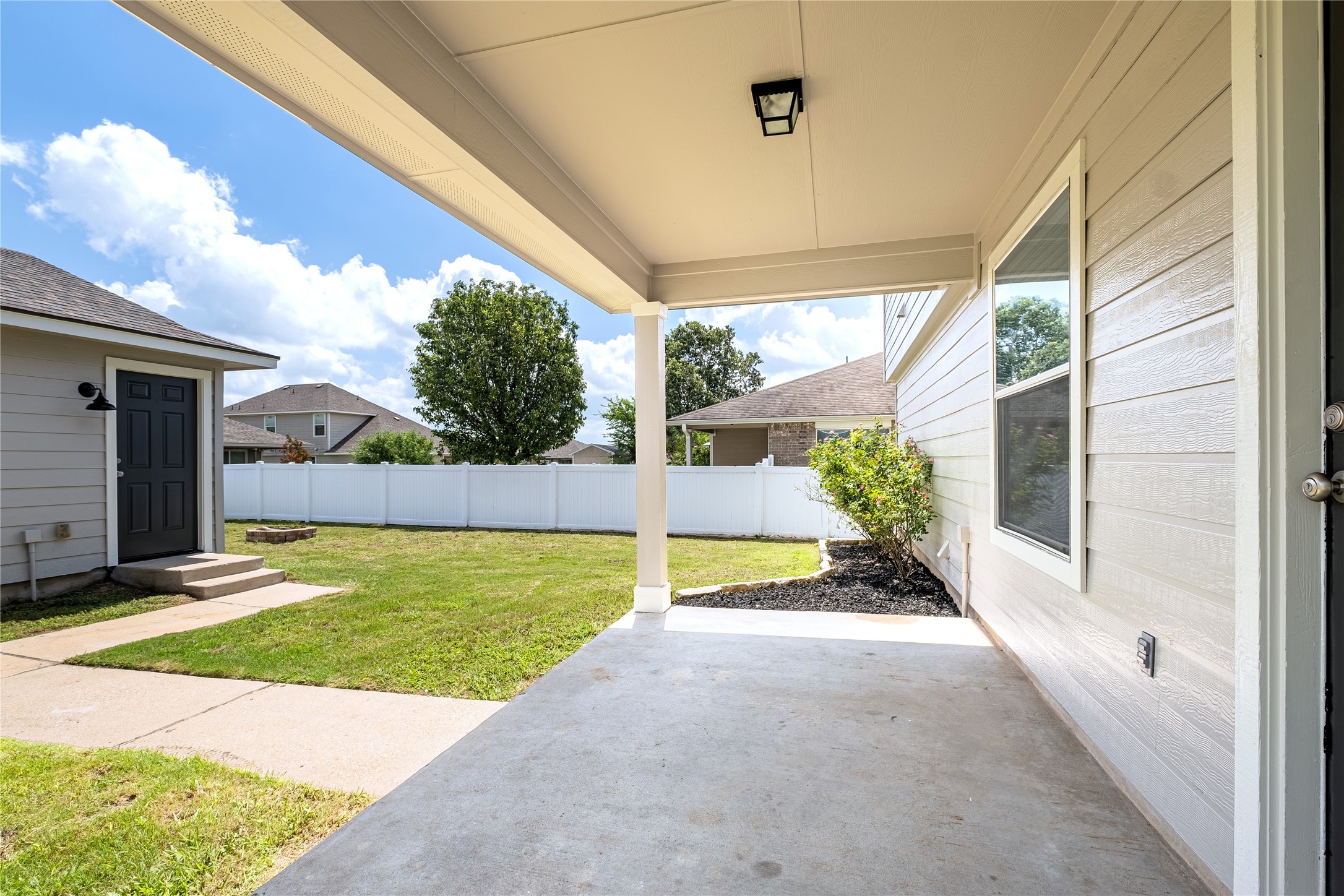 1400 Portchester Castle Path Pflugerville, TX 78660 - Photo 37 of 40 Fenced backyard featuring a patio