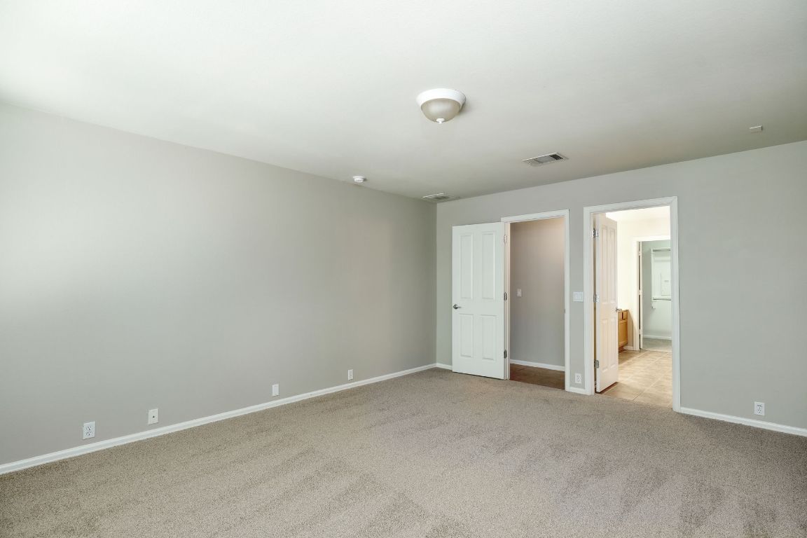 409 Lark Street Leander, TX 78641 - Photo 6 of 14 a view of an empty room