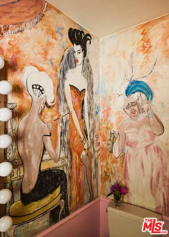 a bathroom with a toilet and sink