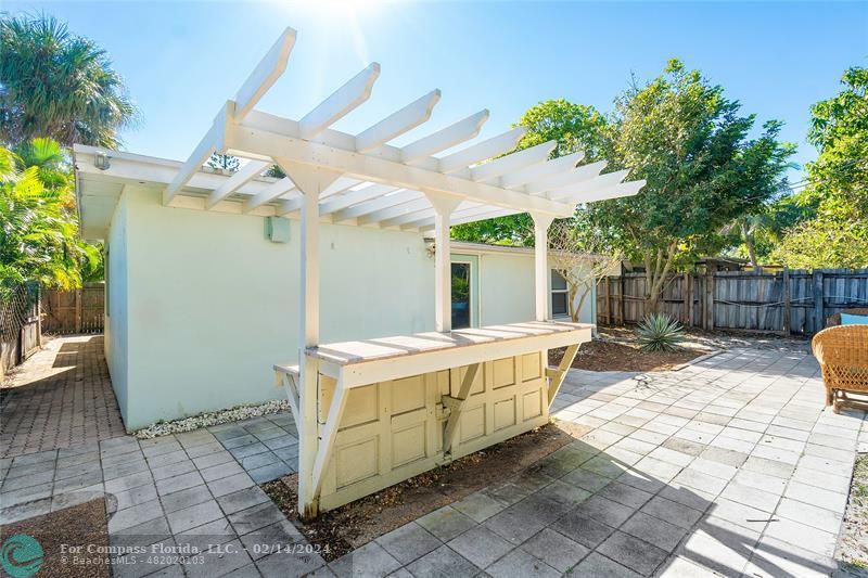 321 Forsyth Street Boca Raton, FL 33487 - Photo 22 of 22 a view of a house with backyard and sitting area