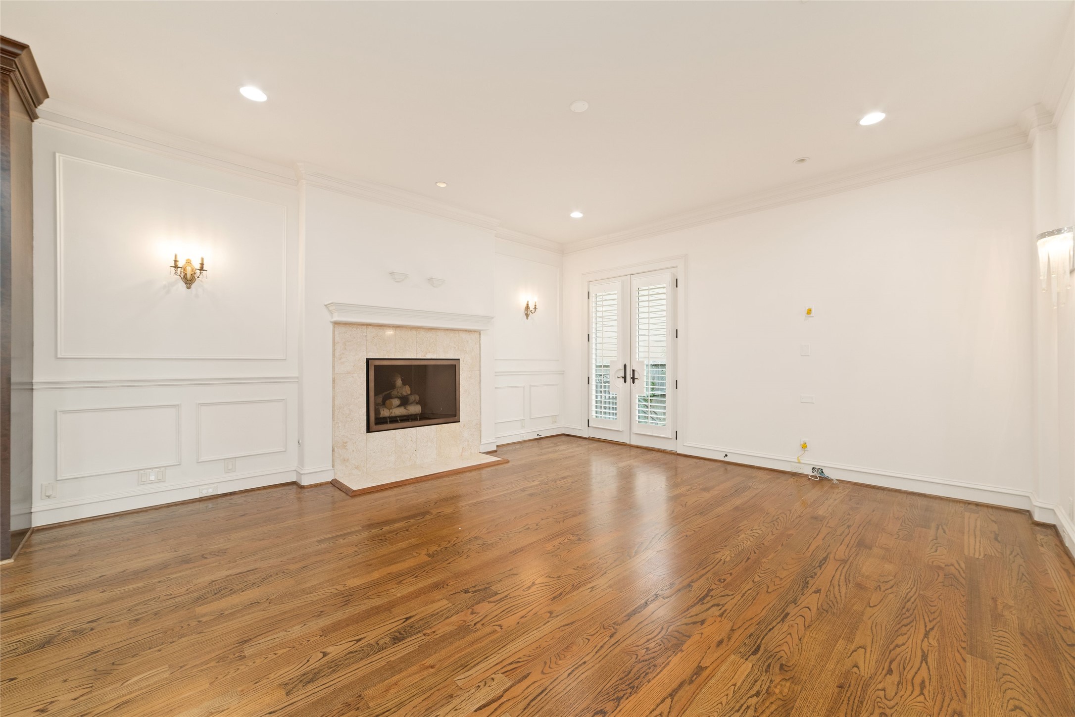 4102 Gramercy Street Houston, TX 77025 - Photo 7 of 35 an empty room with wooden floor and windows