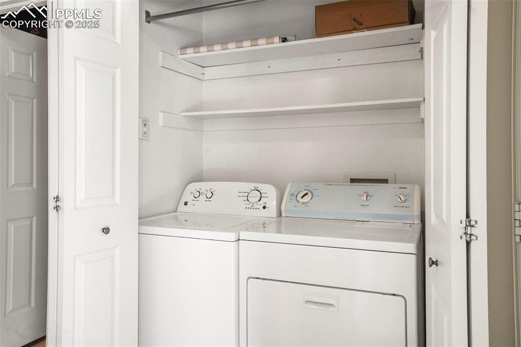 1244 Samuel Point Colorado Springs, CO 80906 - Photo 20 of 22 a utility room with dryer and washer