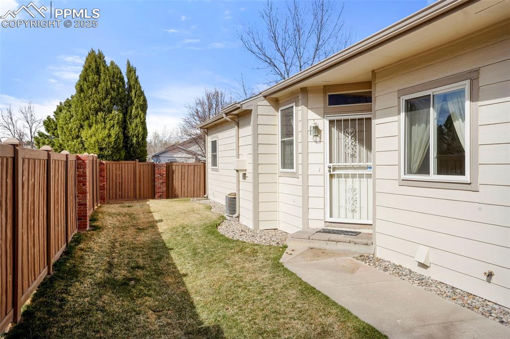 1244 Samuel Point Colorado Springs, CO 80906 - Photo 22 of 22 a backyard of a house