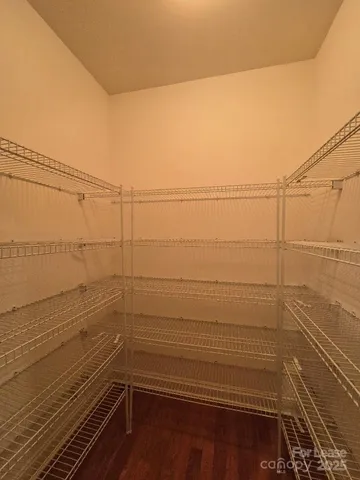 a view of a room with an empty space