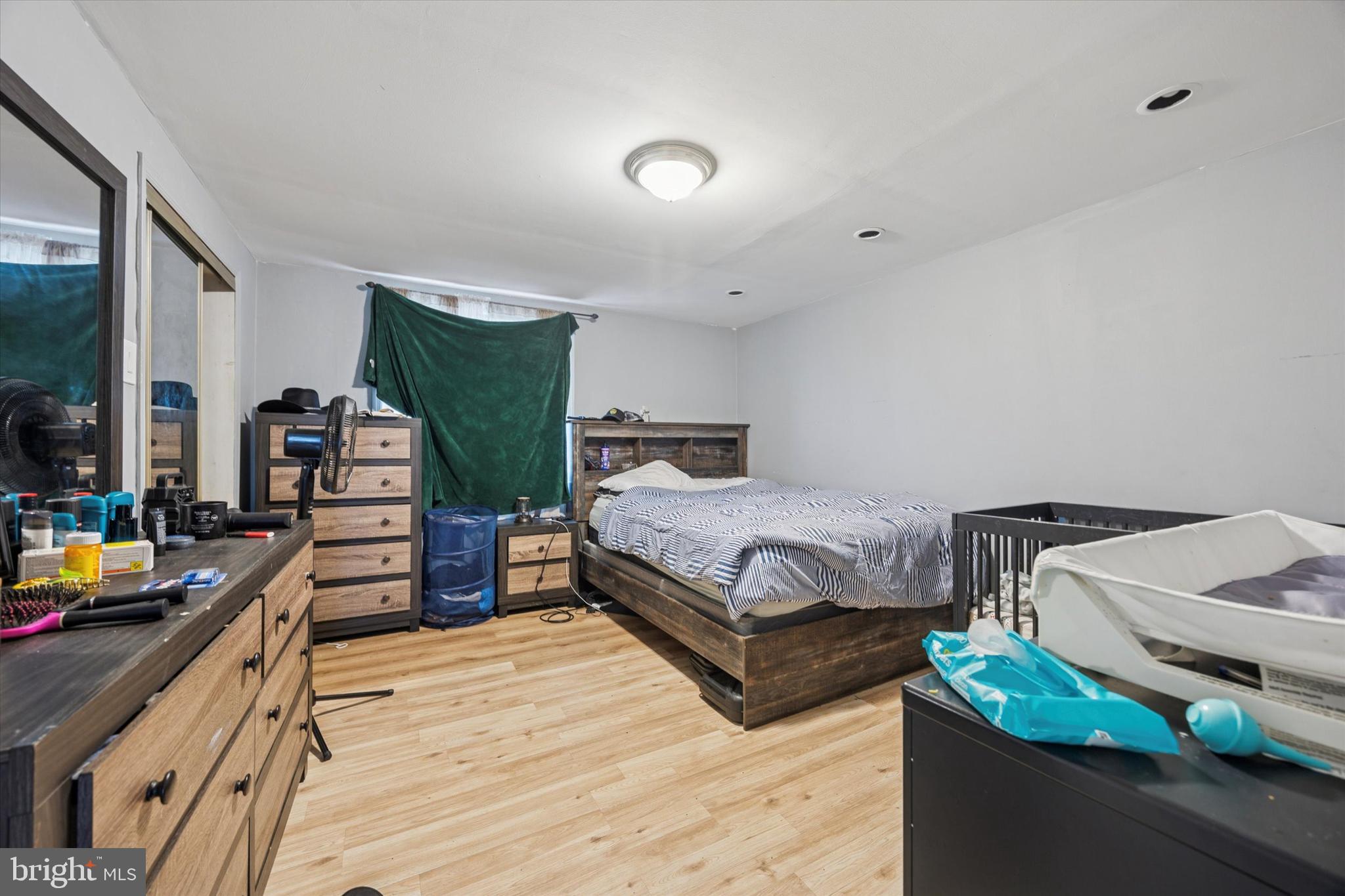 1946 Carter Road Folcroft, PA 19032 - Photo 11 of 26 a bedroom with bed and a wooden floor
