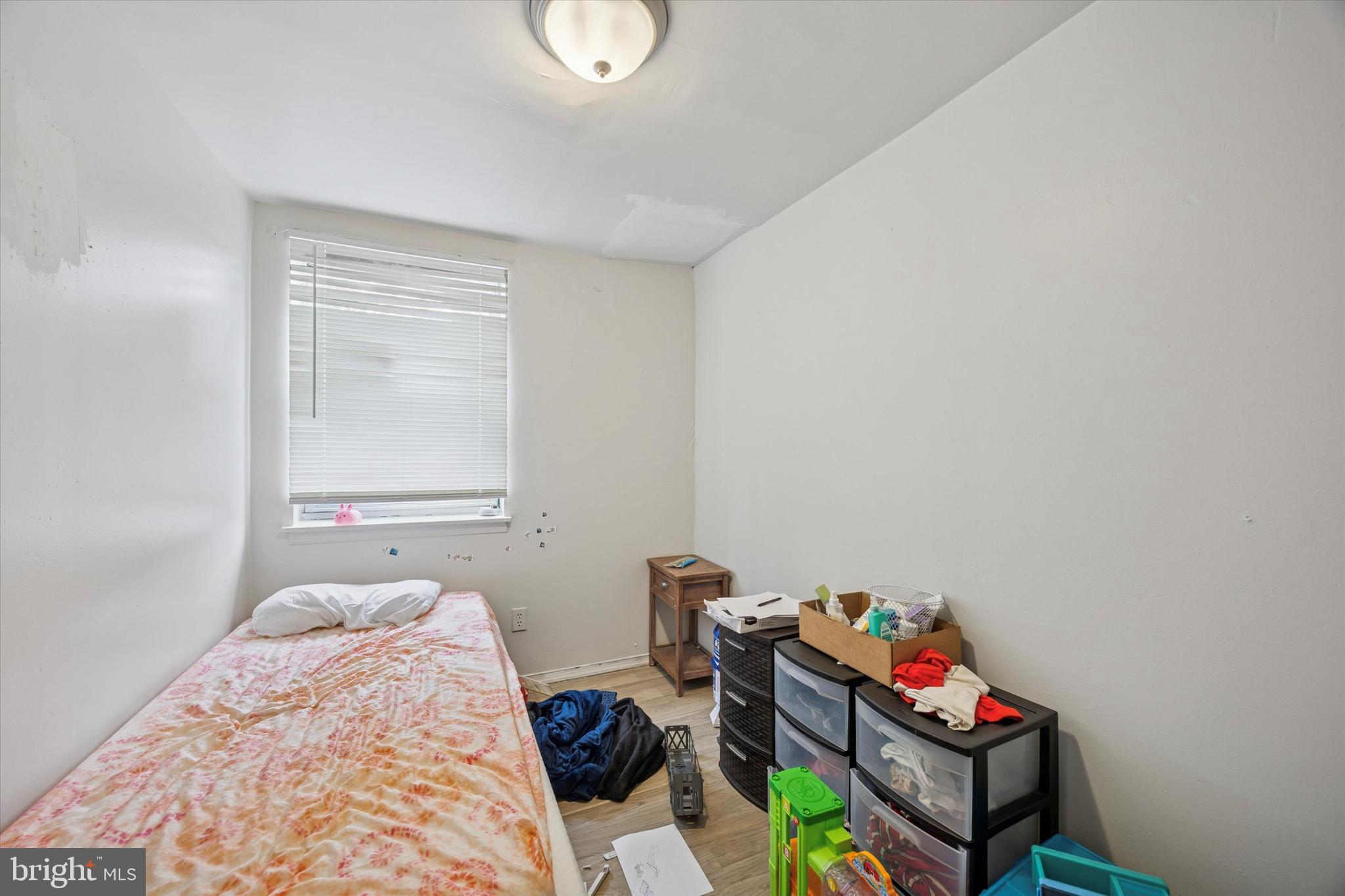 1946 Carter Road Folcroft, PA 19032 - Photo 13 of 26 a bedroom with a bed and a window
