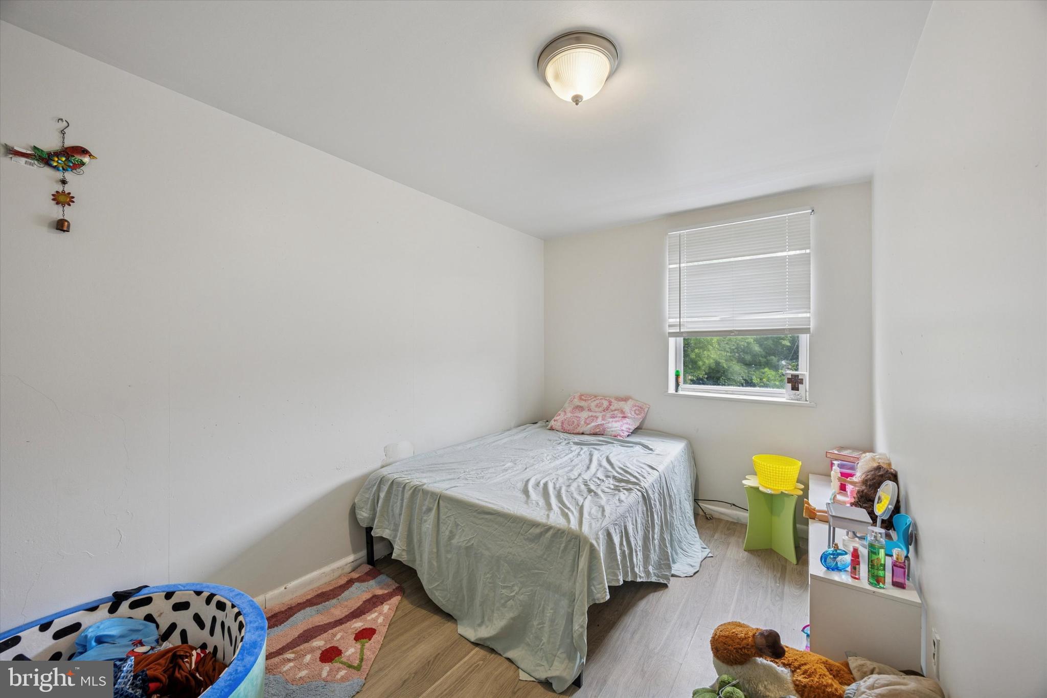 1946 Carter Road Folcroft, PA 19032 - Photo 15 of 26 a bedroom with a bed and a window