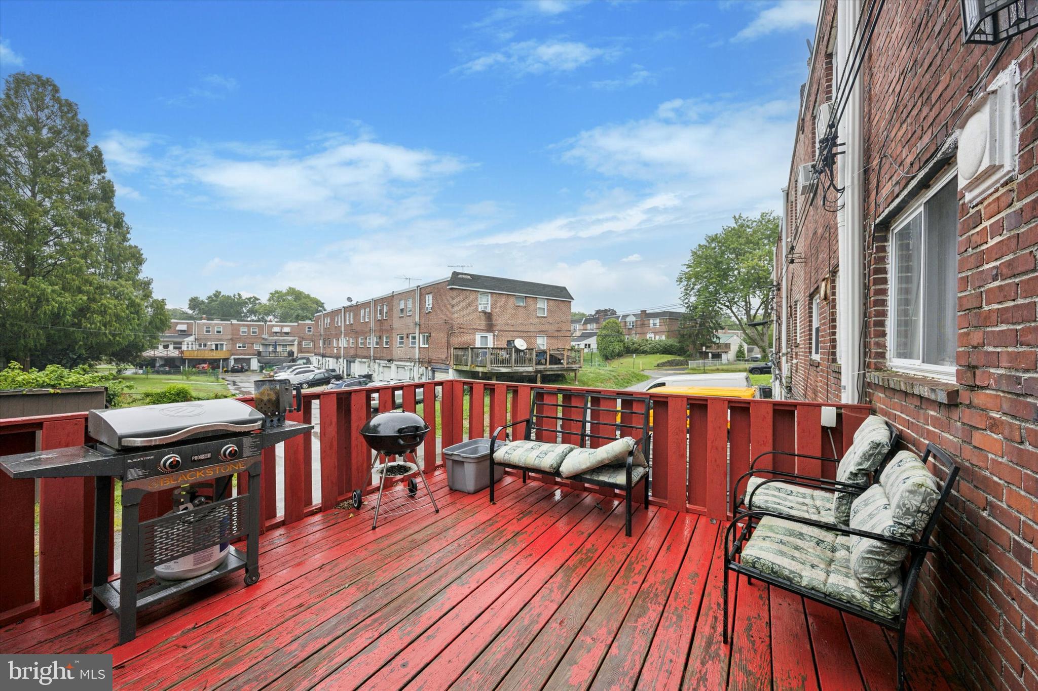1946 Carter Road Folcroft, PA 19032 - Photo 23 of 26 a balcony with wooden floor outdoor seating and city view