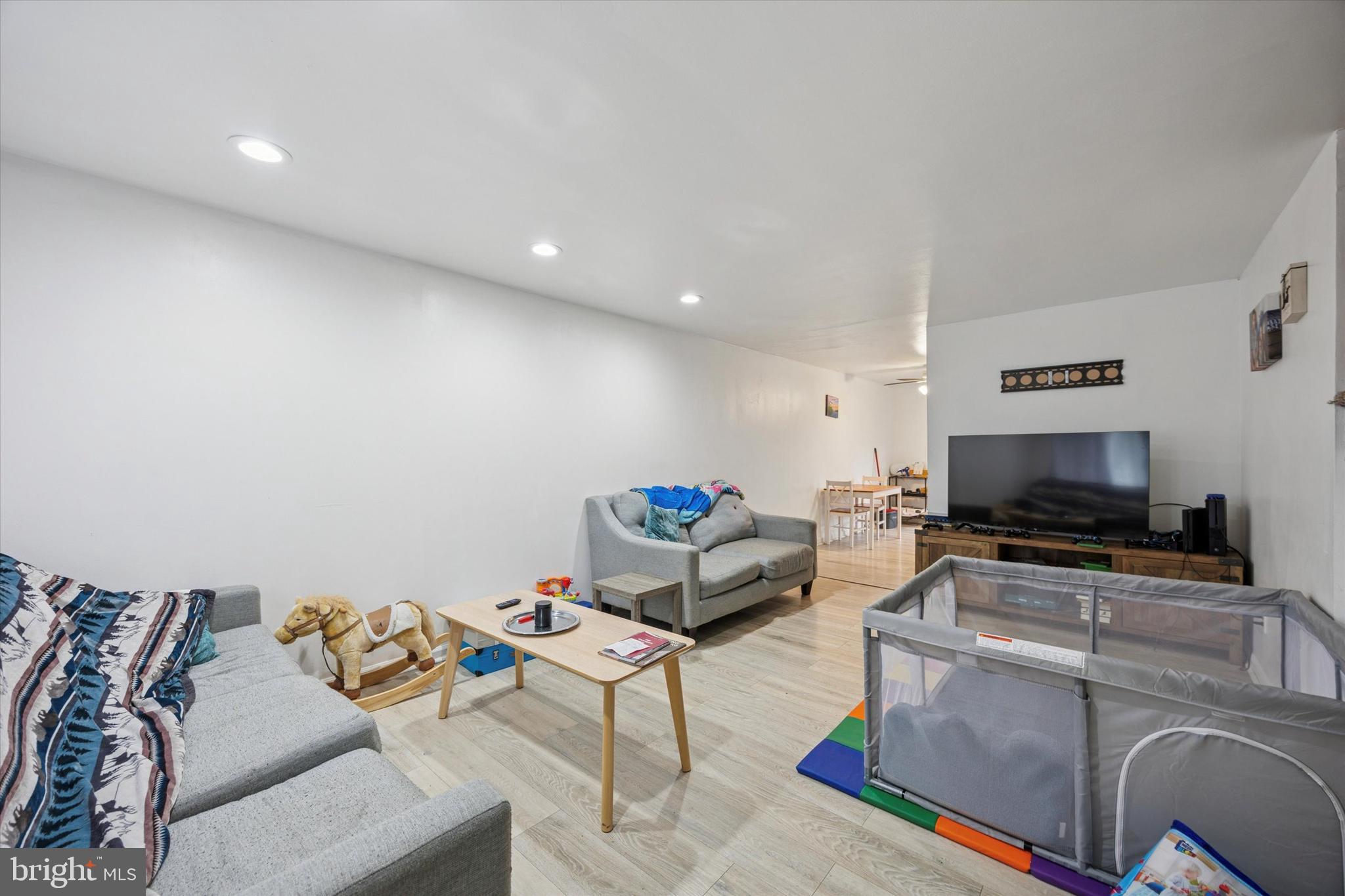 1946 Carter Road Folcroft, PA 19032 - Photo 3 of 26 a living room with furniture and a flat screen tv