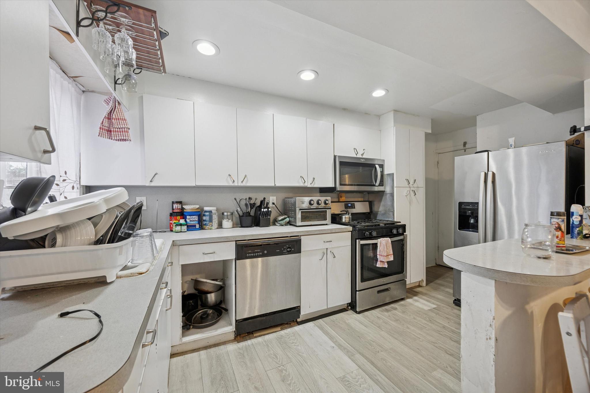 1946 Carter Road Folcroft, PA 19032 - Photo 5 of 26 a kitchen with a sink appliances and cabinets