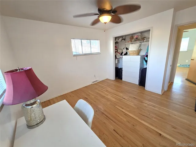 a bathroom with a toilet and shower