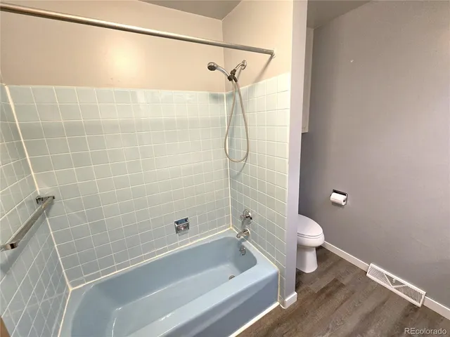 a room with a sink and a mirror