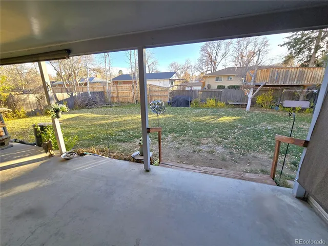 a view of an empty room and window